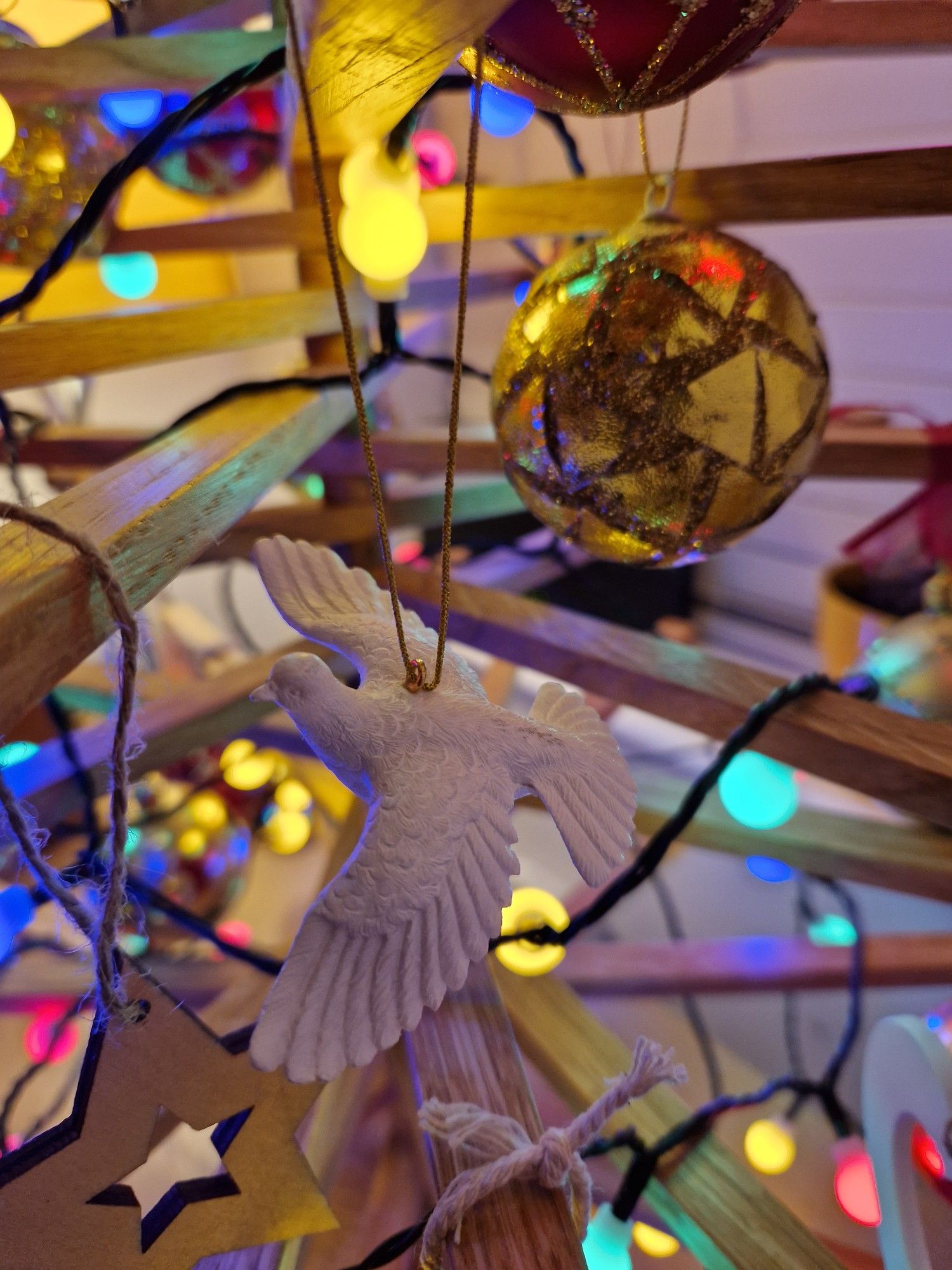 Porcelain-esque dove Christmas decoration.