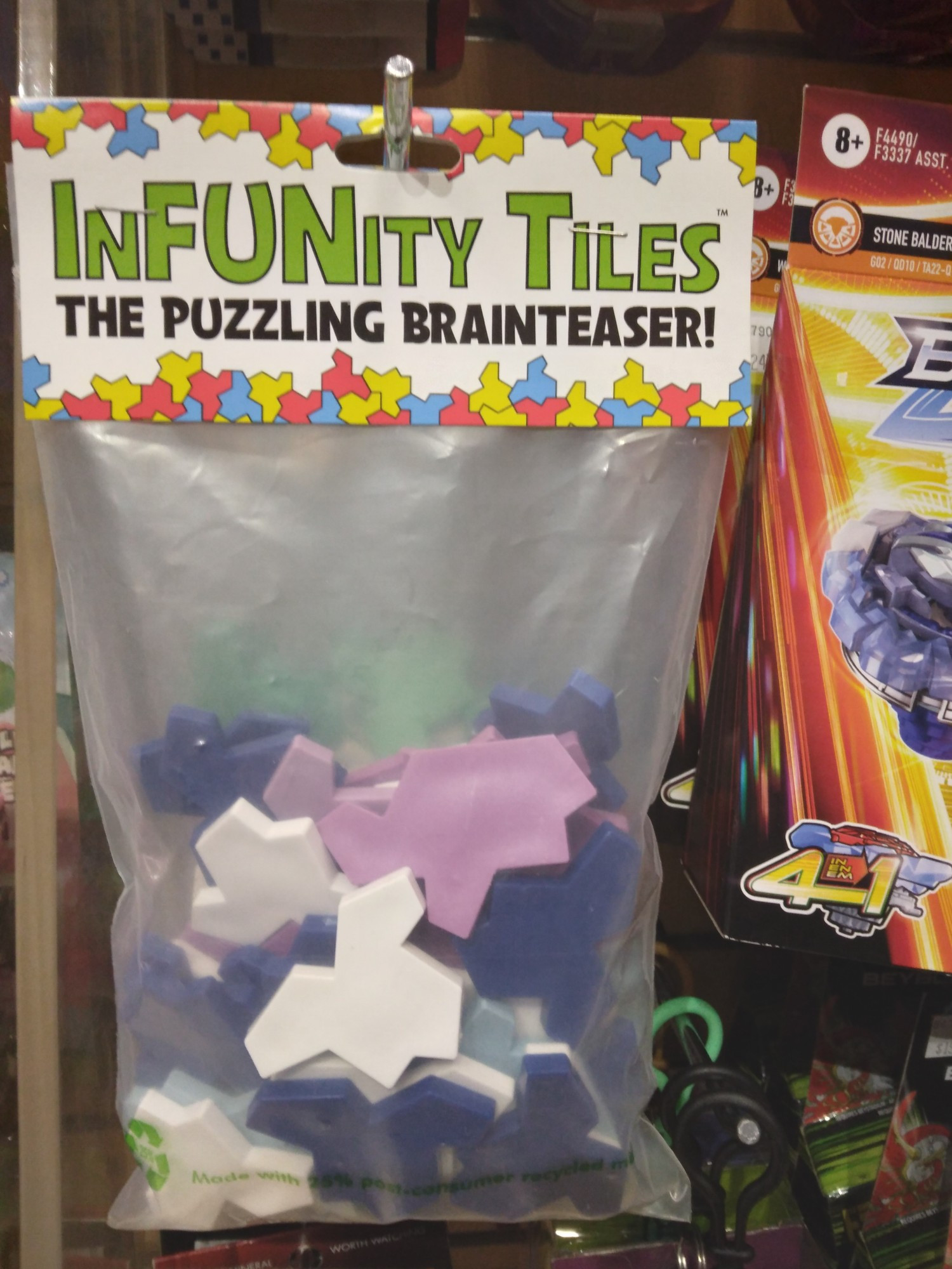 InFUNity Tiles from MN-based Atlas Games hang on a hook at the Air Traffic Toys at Mall of America.