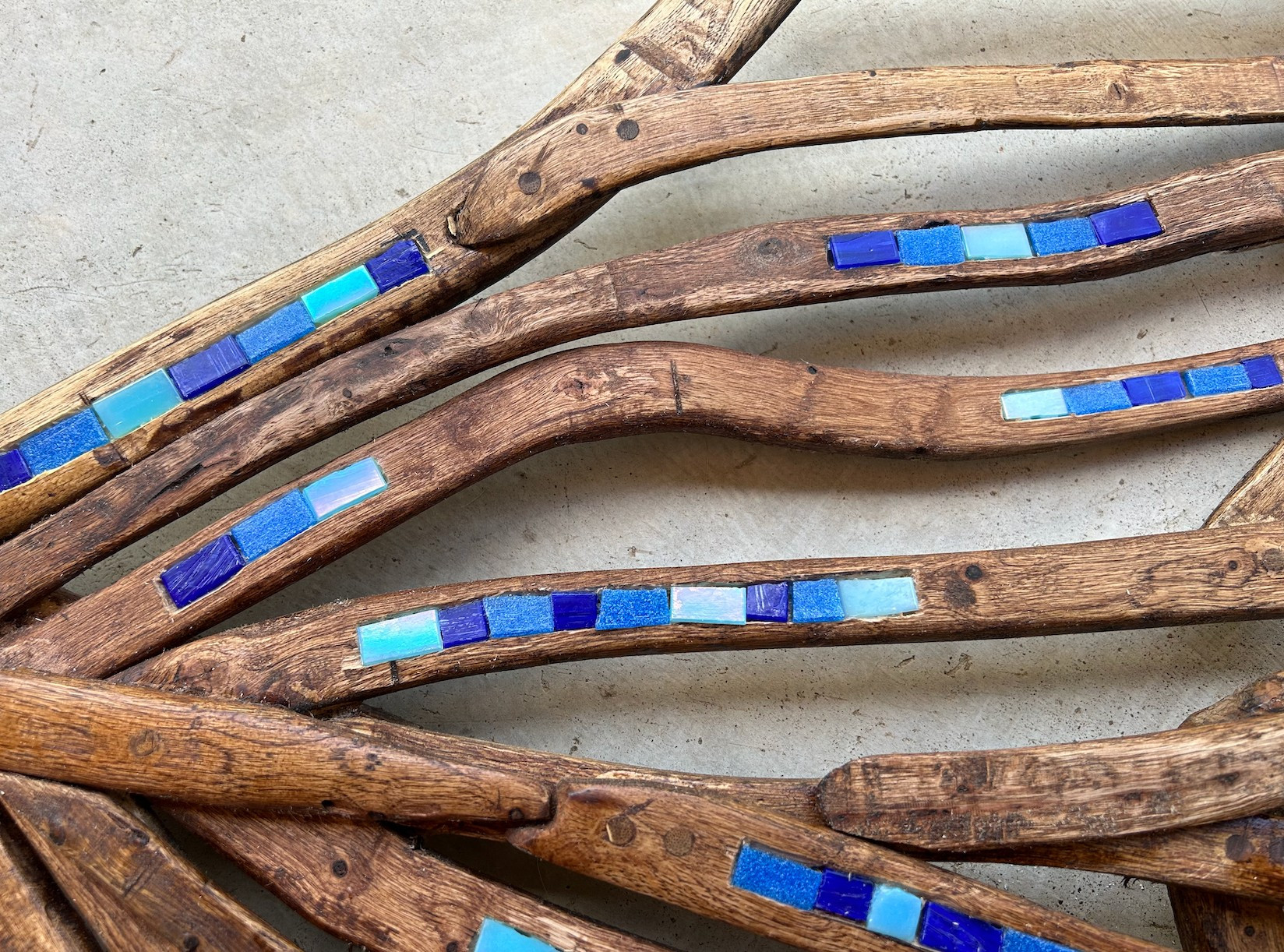 Tail detail with varicolored blue inset tiles