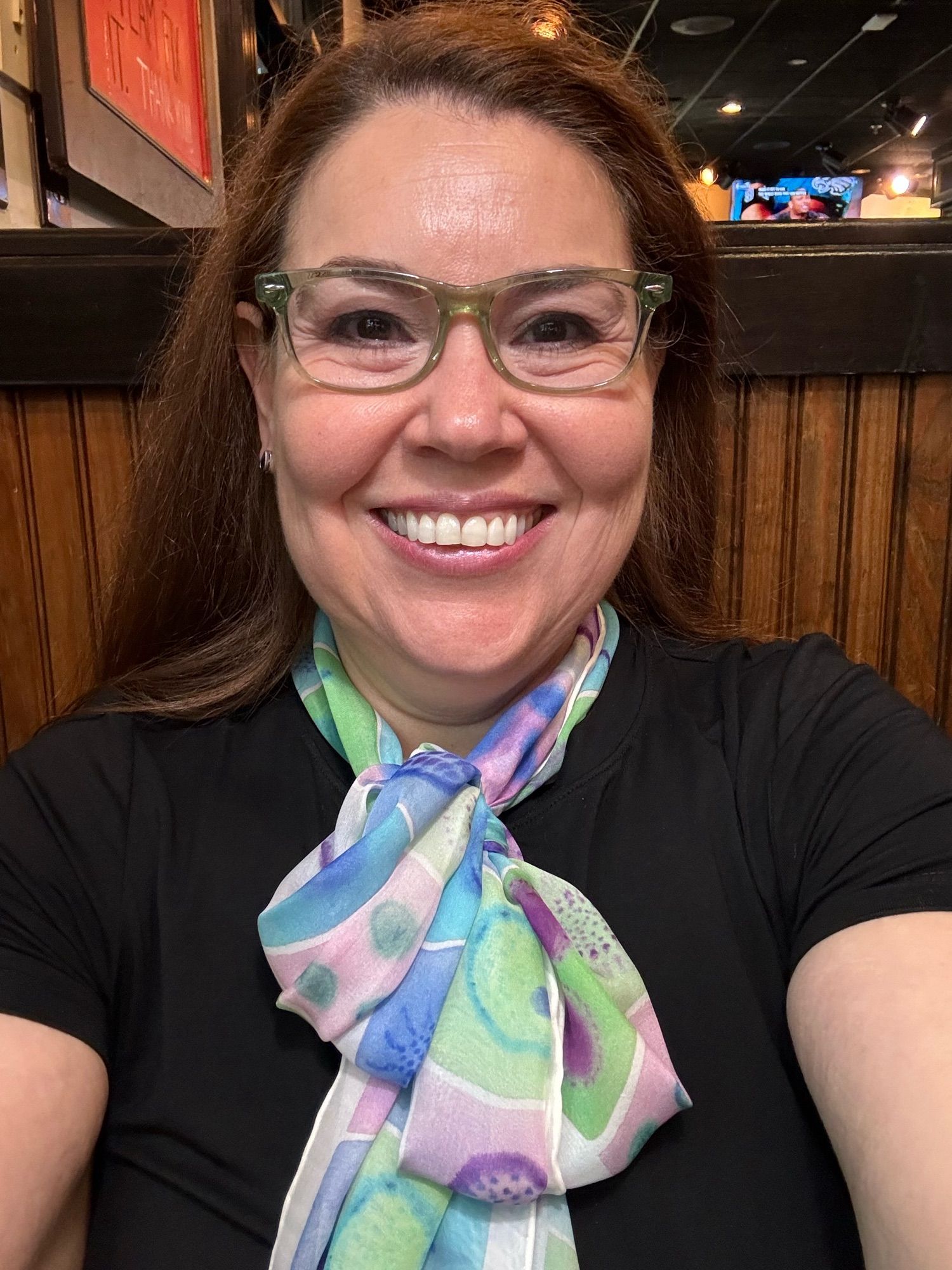 Smiley woman wearing a microbe scarf