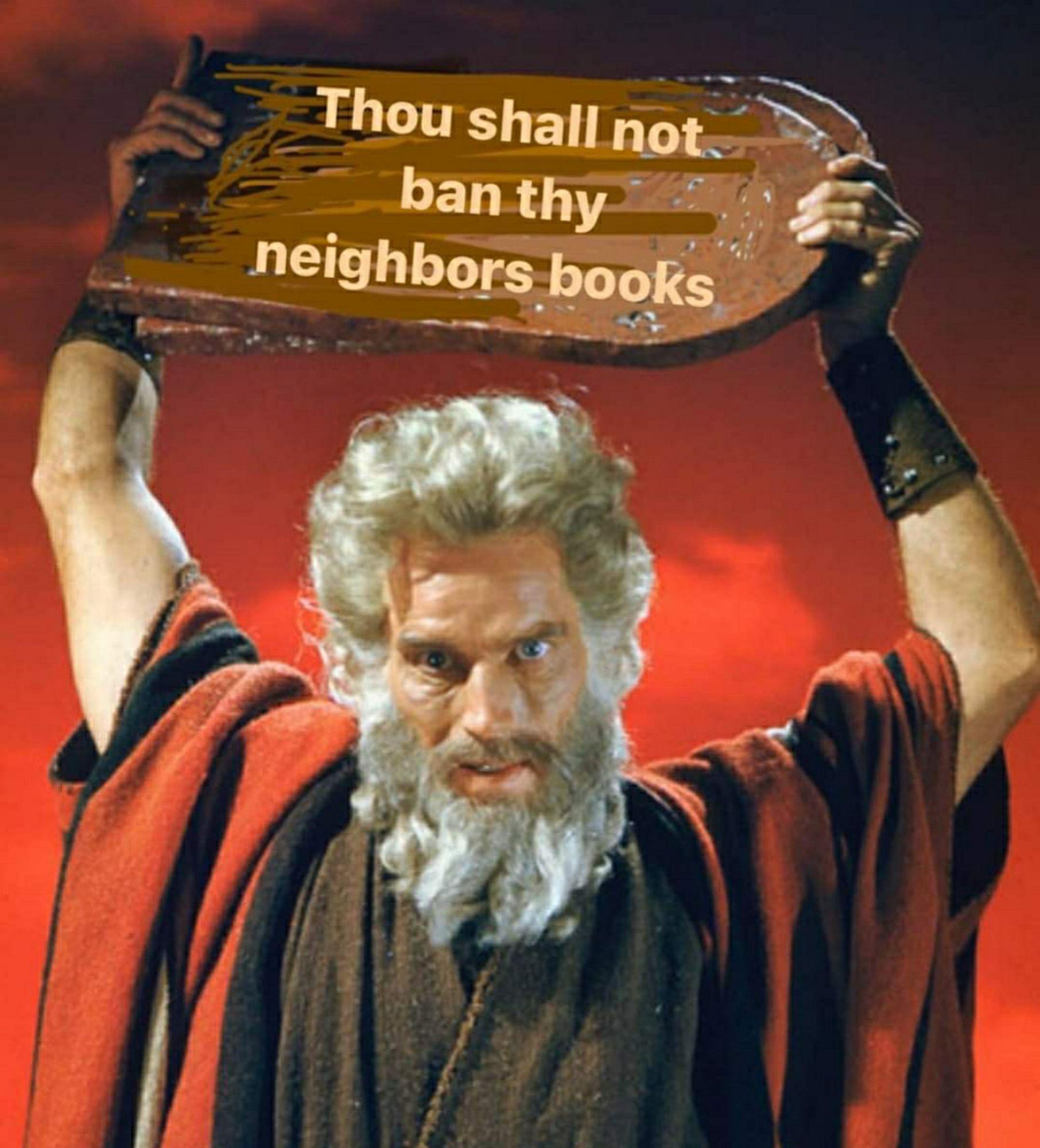 Moses holding a tablet that say "thou shall not thy neighbors books"