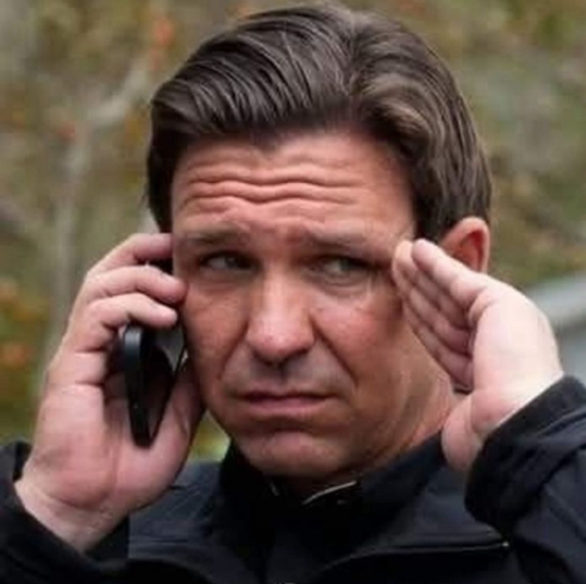 Ron DeSantis looking stressed and touching his temples while holding a cell phone 

lol 

Lololol