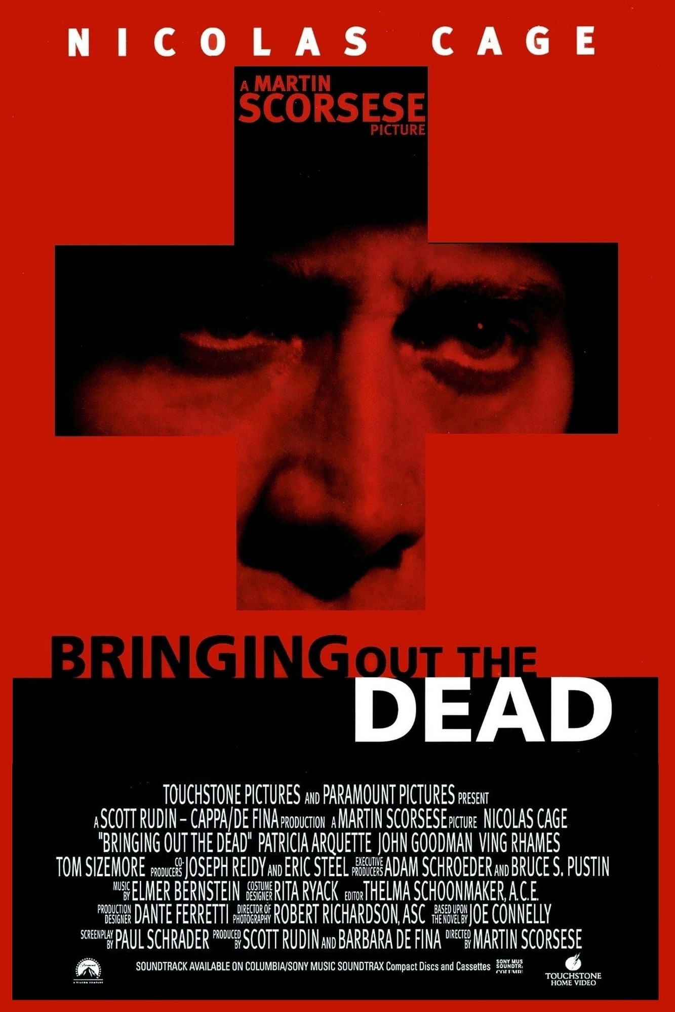 A promotional poster for Bringing Out the Dead, which shows a red foreground in which a cross-shaped cutaway in the center rests. Behind it can be seen Nicolas Cage's face.