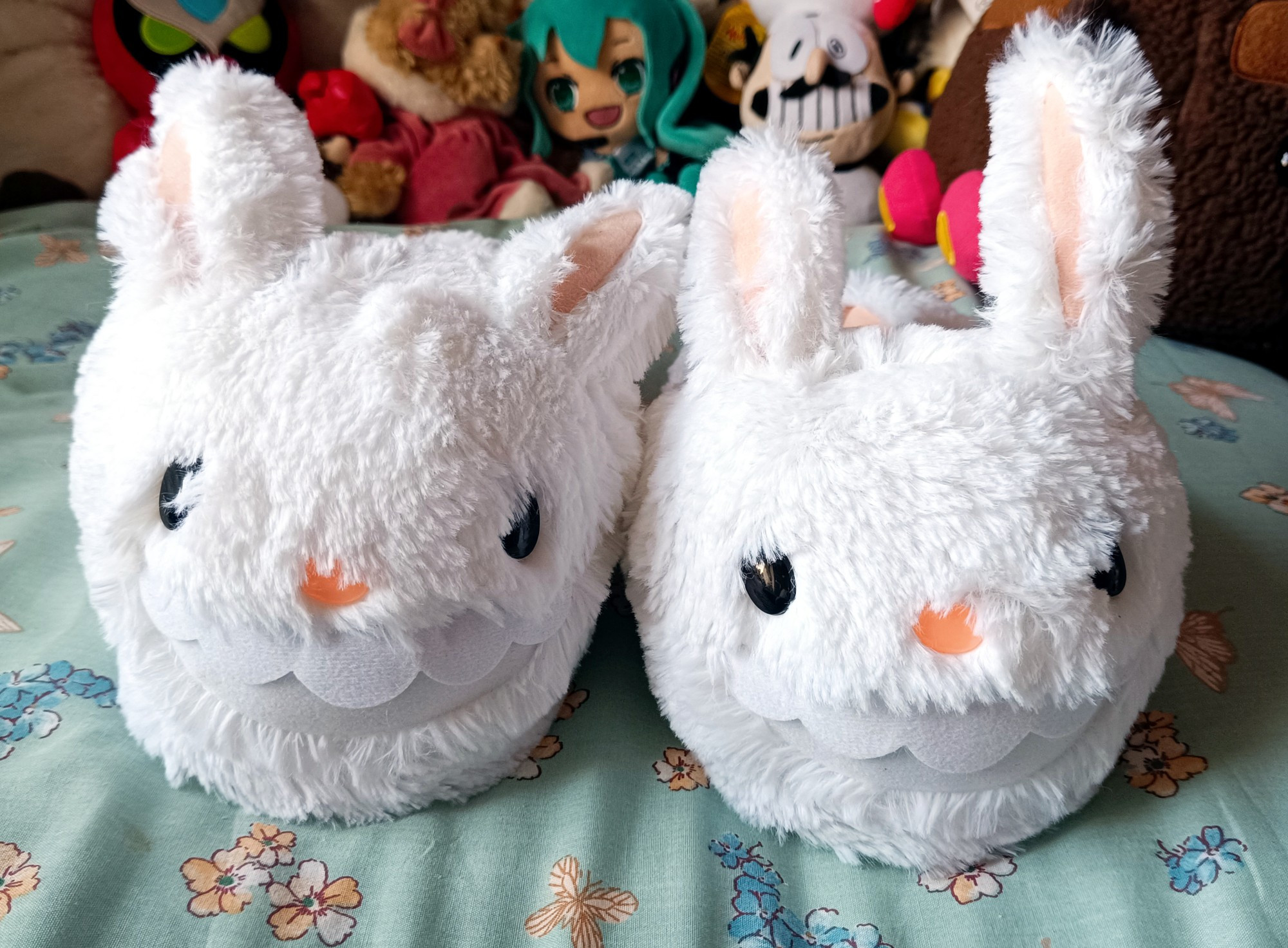 Photo of Max slippers. It's the fuzzy white head of Max from Sam & Max as slippers!