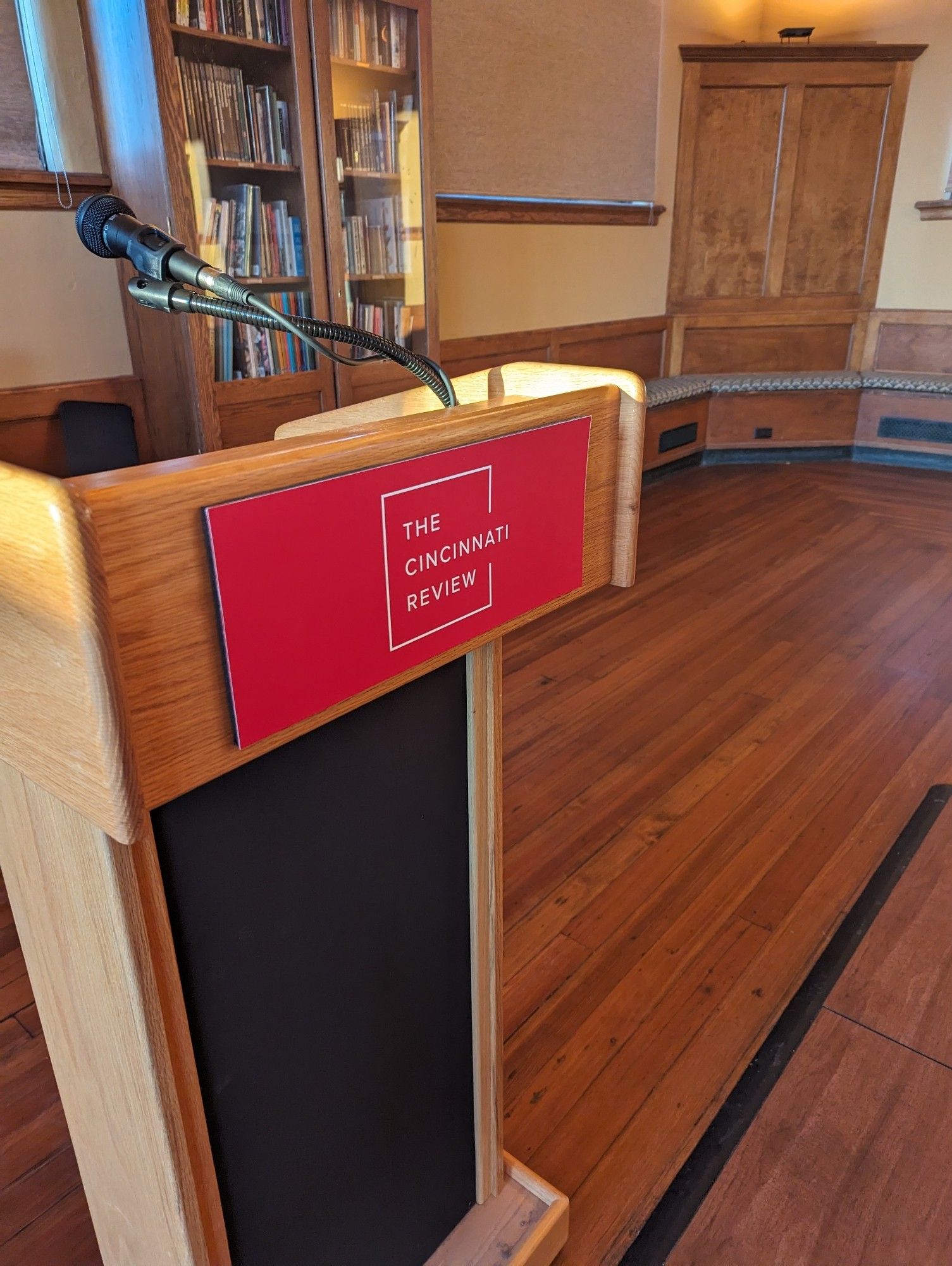 A podium with a red Cincinnati Review logo