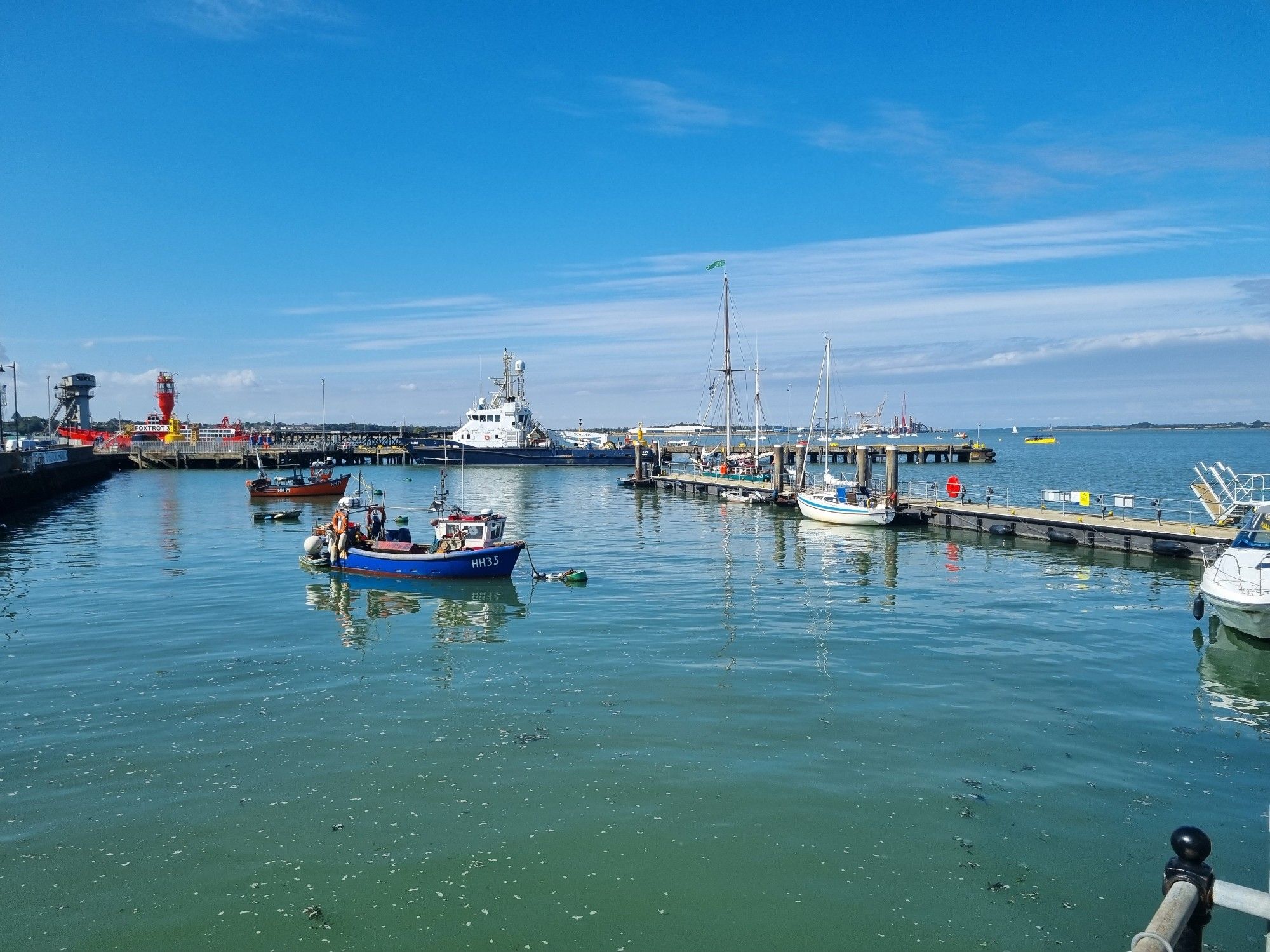 Photo taken from Ha'Penny Pier. Pontoons on the right, THV Alert central, a lightvessel to the left and Harwich Train Ferry Terminal extreme left