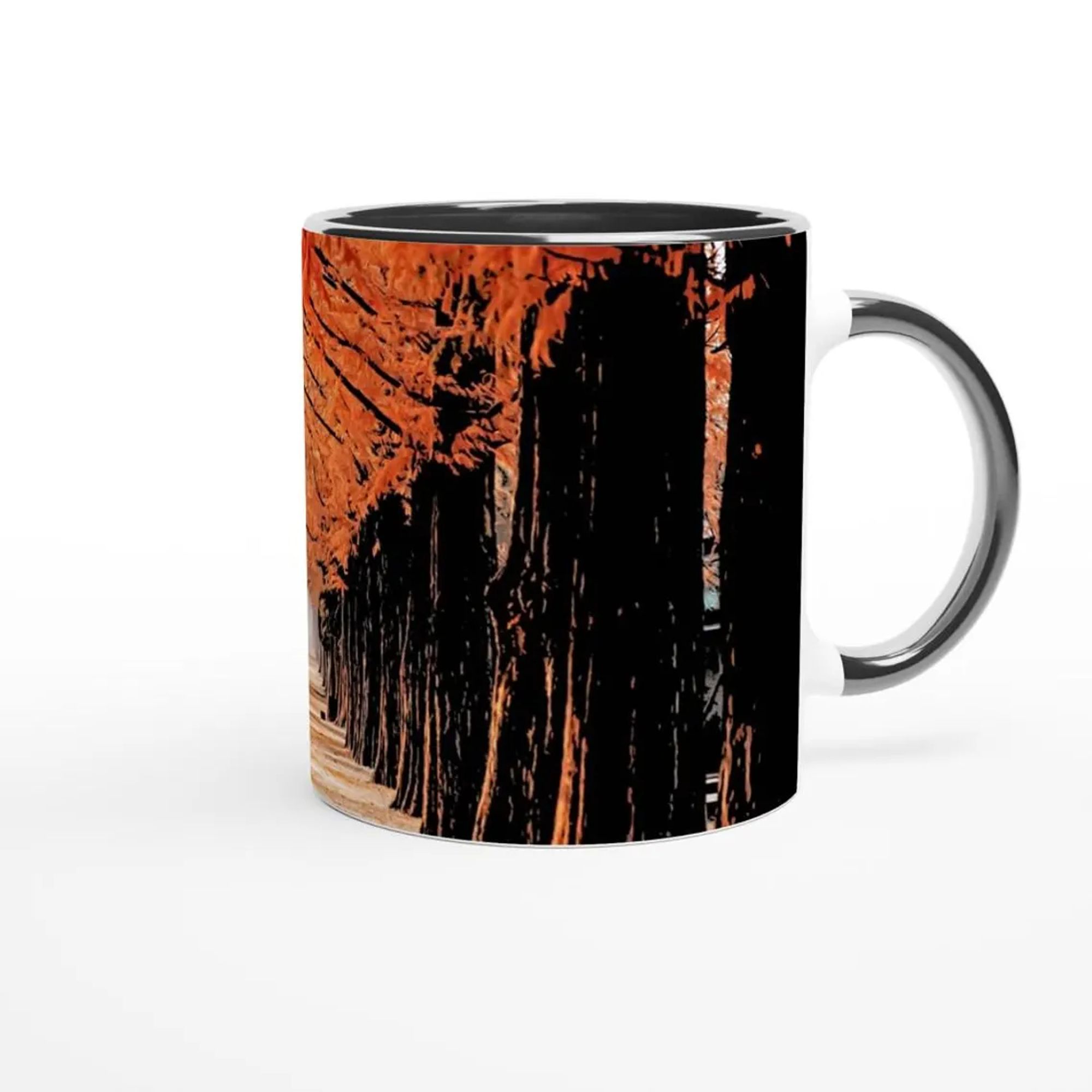 A mug showing a lush and brightly orange forest lane, with a lonely figure at the end.