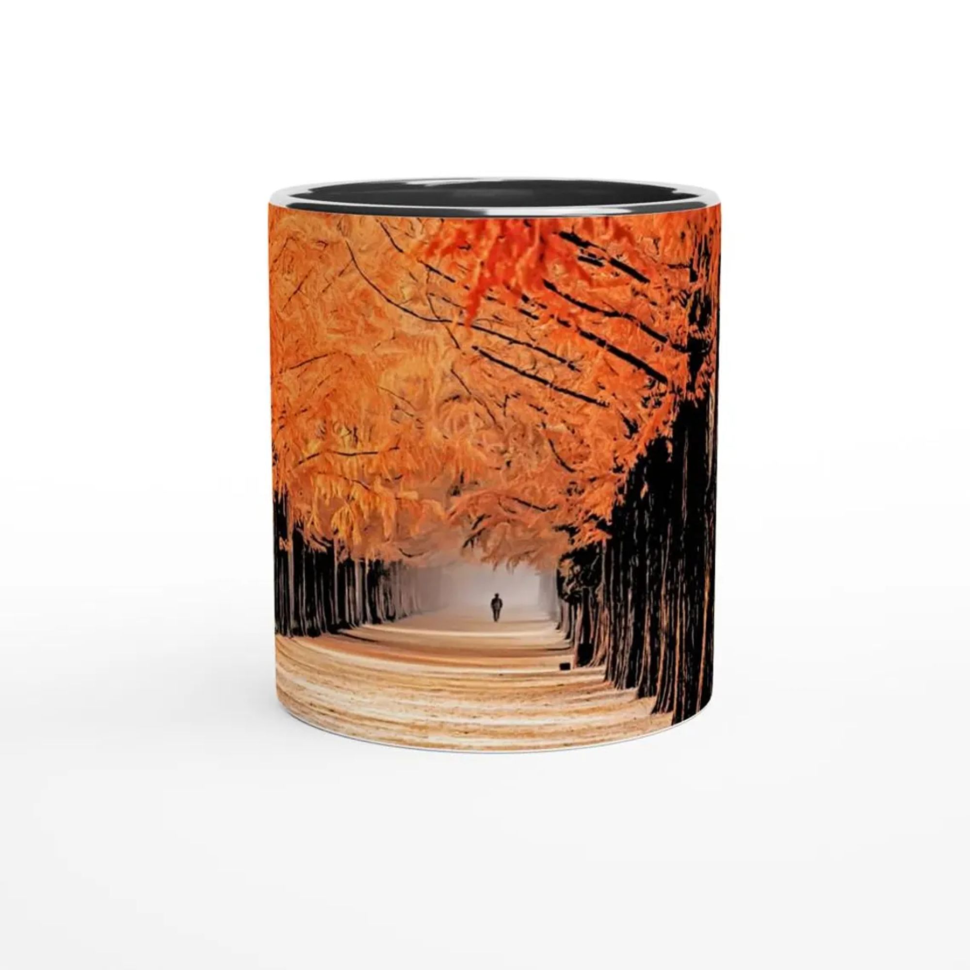 A mug showing a lush and brightly orange forest lane, with a lonely figure at the end.