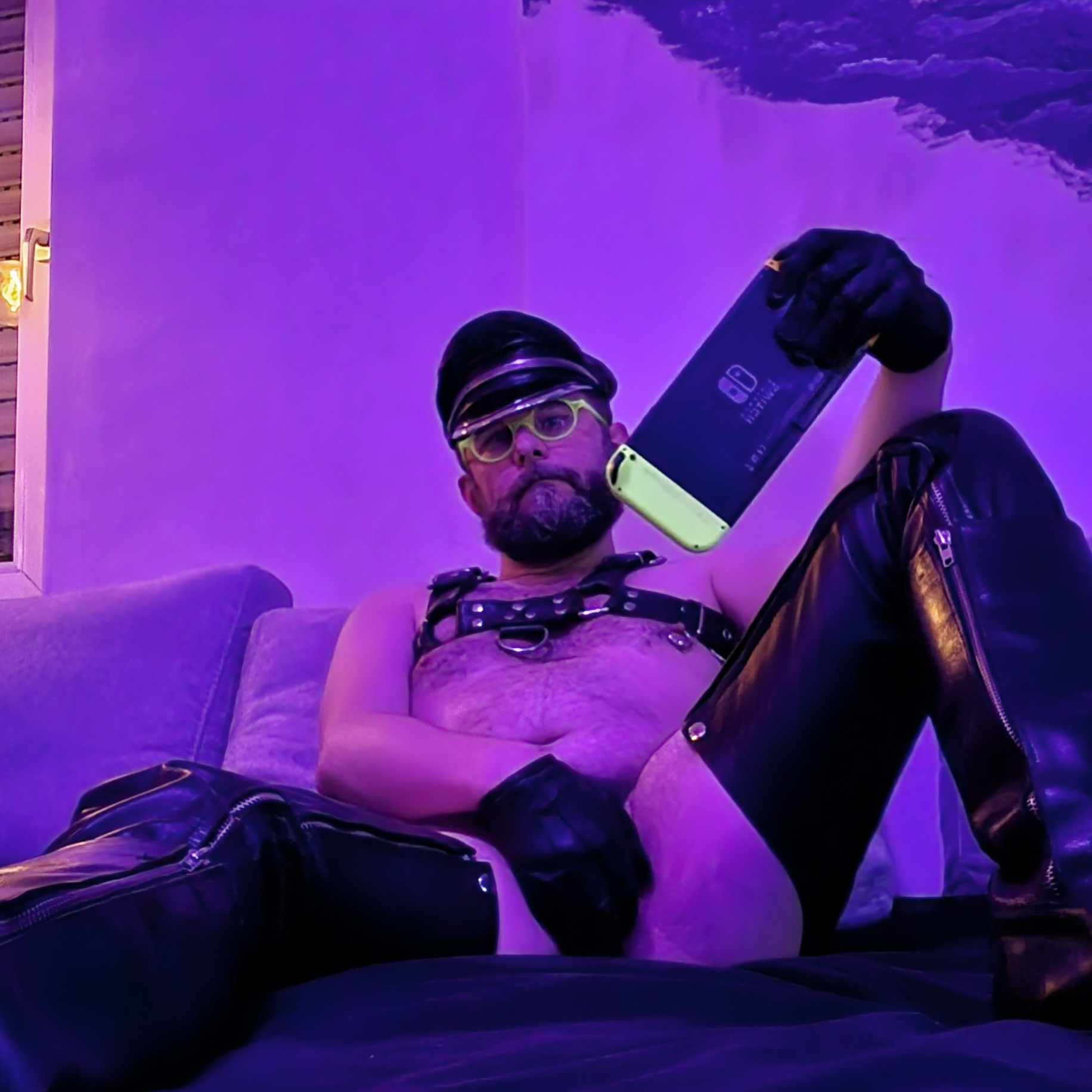 Me in leather playing Nintendo switch