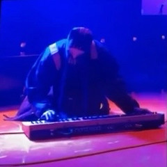 clancy playing the keyboard, on the ground