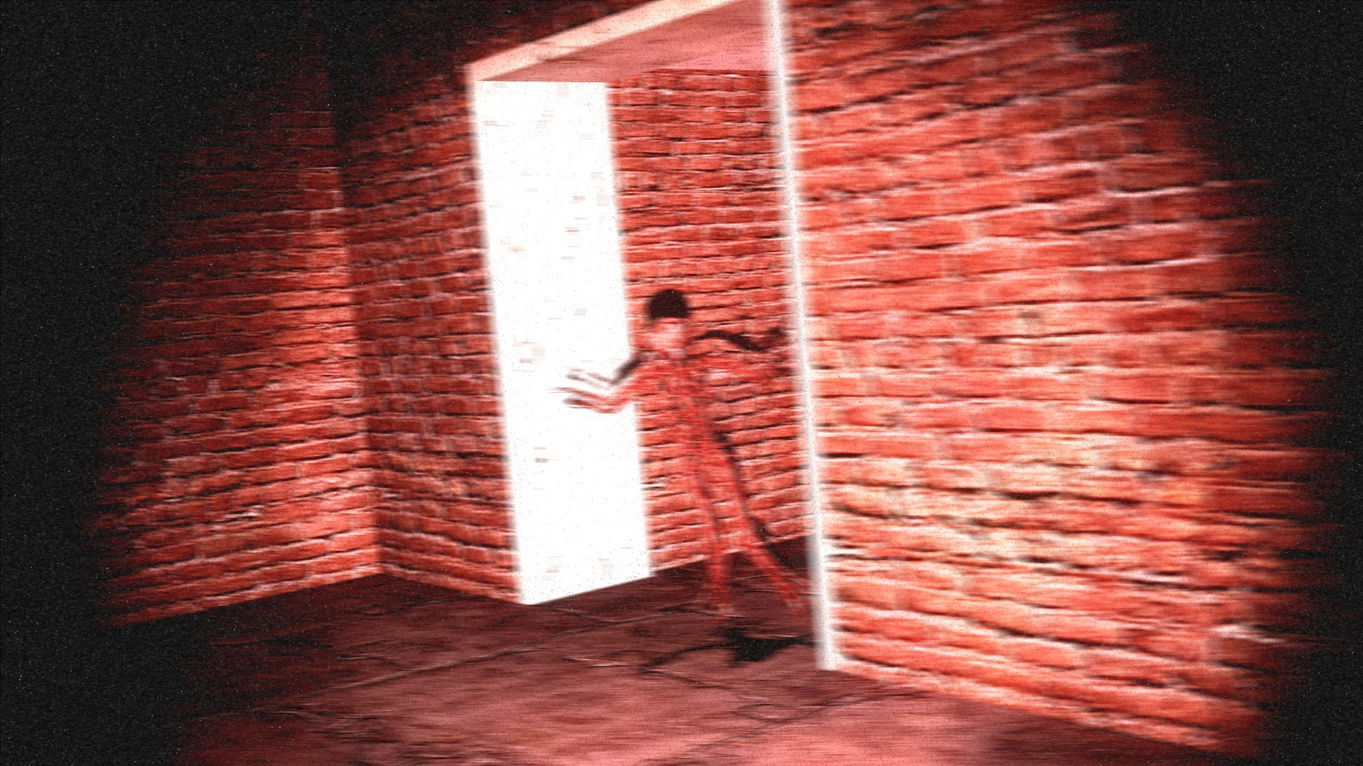 A grainy, blurry, red image of a Nervous System chasing the photographer through a brick hallway.