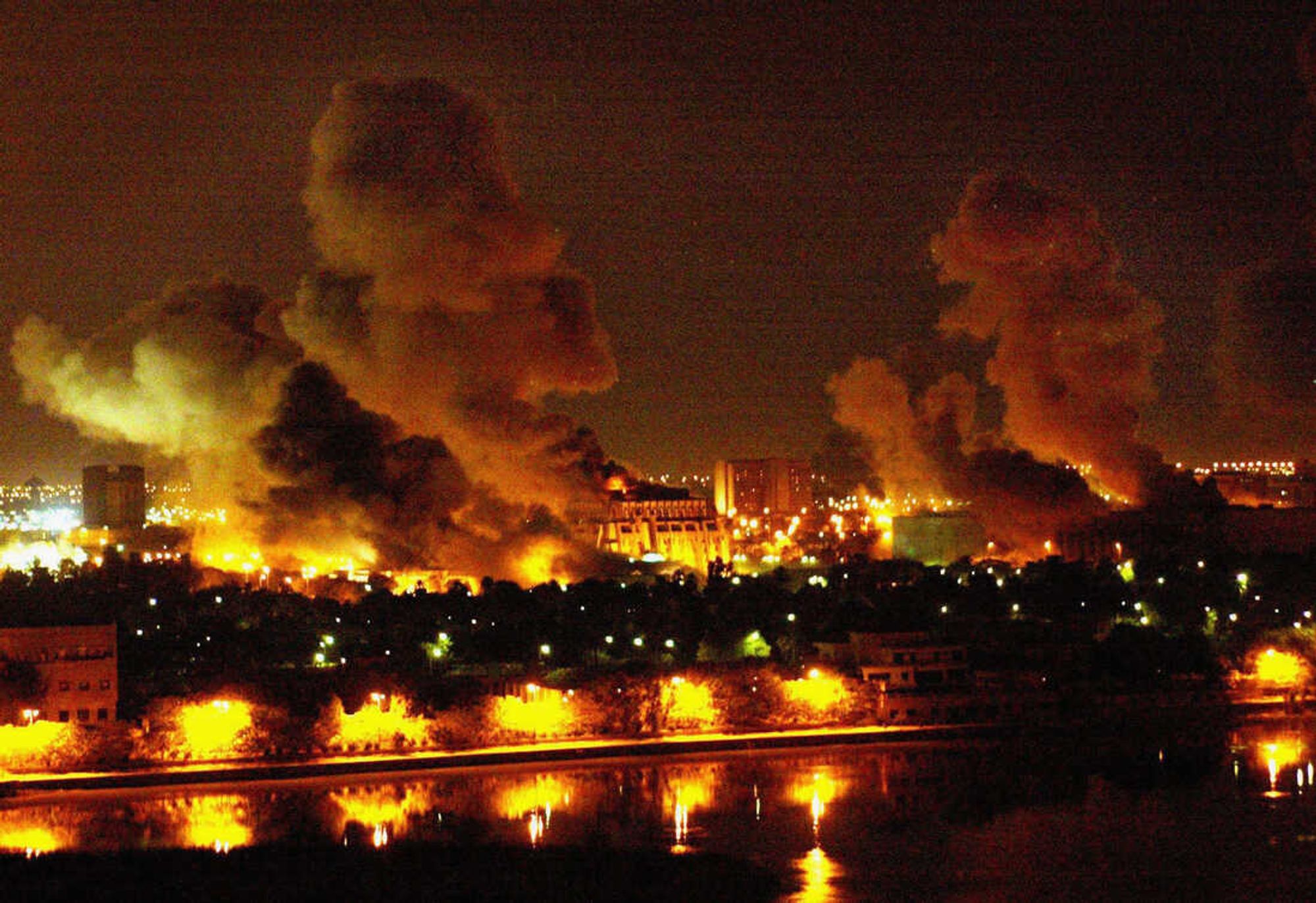 "This Is The Day", a poem by Bruce Arthurs about the start of George Bush's Iraq War in 2003. Image is of Baghdad, lit by fires and towering pillars of smoke at the start of the US bombing campaign.

This Is The Day

This is the day.
This is his Big Day.
This is the Biggest! Bestest! day
of his life.

This is the day
he will be remembered for.
This is the day
his father’s folly is erased.

This is the day
the naysayers are silenced.
This is the day
their numbers could not stop.

This is the day
the missiles will fly.
This is the day
when ancient cities burn.

This is the day
collaterals are damaged.
This is the day
that Jesus will applaud.

This is the day
his name becomes immortal.
This is the day
he finally shows them all.

This is the day.
This is his Big Day.
This is the Biggest! Bestest! day
of his life.
