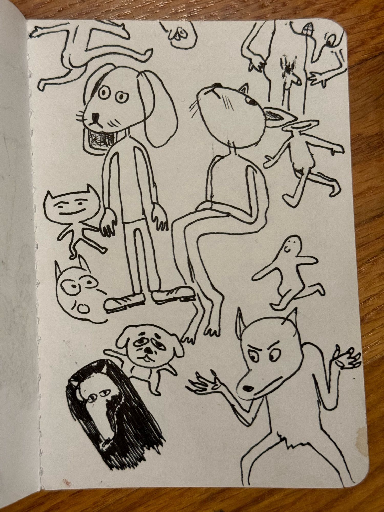 A sketchbook page full of pen drawings. A figure leaping, a head poking in from the top, a figure complaining about their penis, a dog in casual cloths, a rodent with their head up while sitting, a smiling dancing cat. A surprised critter, a strutting figure with a flattened head, another figure strutting, a tiny old dog looking like an Animal Crossing character, some long shouted critter I gave up on, a confused and dissatisfied werewolf