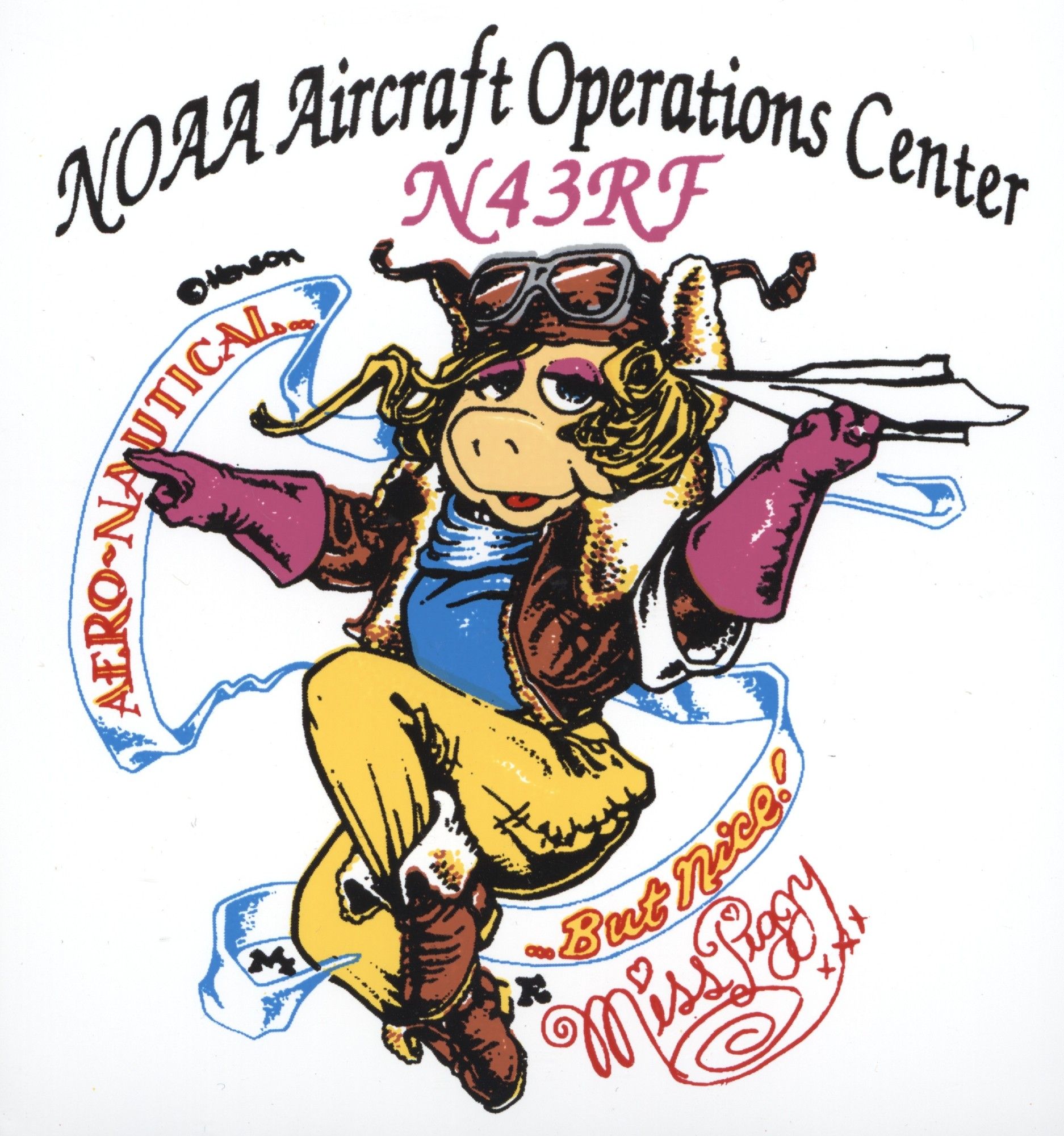 Nose art from N43RF, a Lockheed WP-3D Orion "Hurricane Hunter" aircraft nicknamed Miss Piggy. Miss Piggy, the Muppets character, is depicted in a bomber outfit (jacket, hat, goggles, and boots) and throwing a paper airplane to the left (forward, when painted on the aircraft) and surrounded by a ribbon reading "Aero-Nautical...But Nice!" and a stylistic signature.