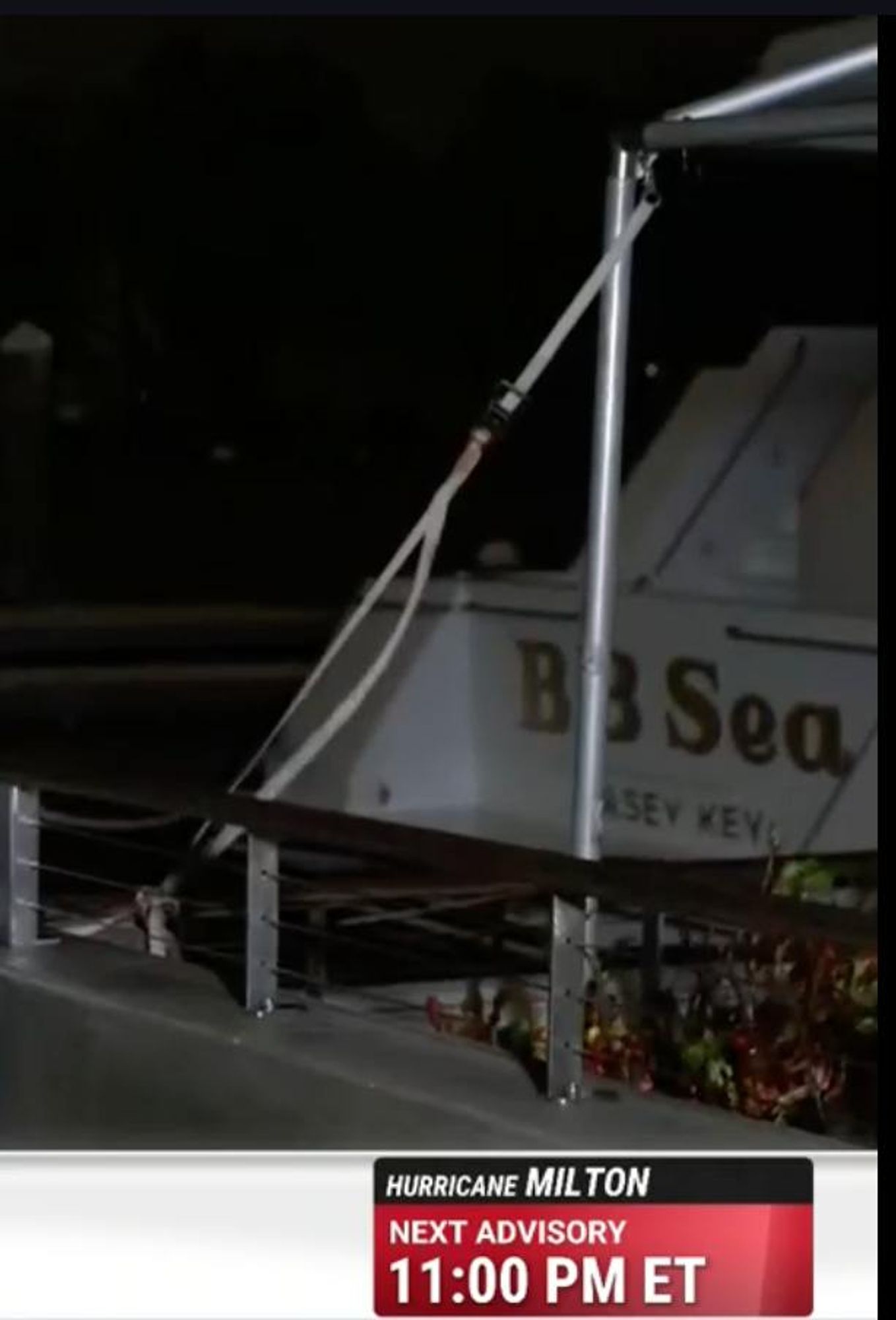 a screenshot of the weather channel showing the rear of a boat named "BB Sea"