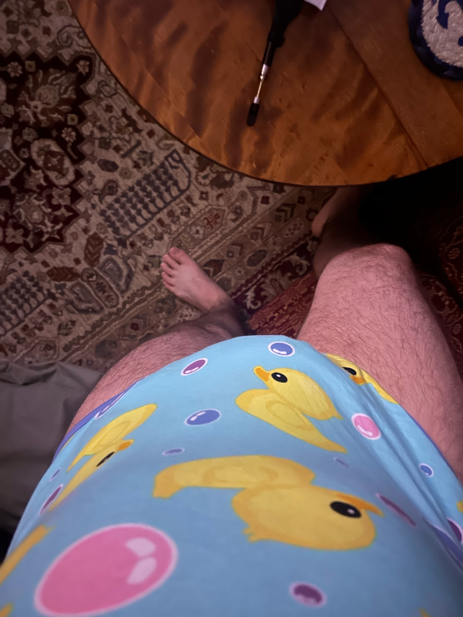 Rubber duck onesie over a diaper 