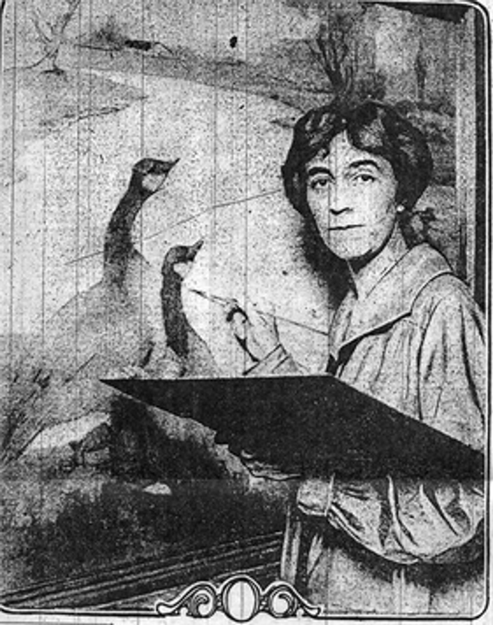 A grayscale photograph of Rowena Meeks Abdy as she works on a painting of geese. She holds a paintbrush and palette, focusing on her canvas, but distracted to look at the camera.