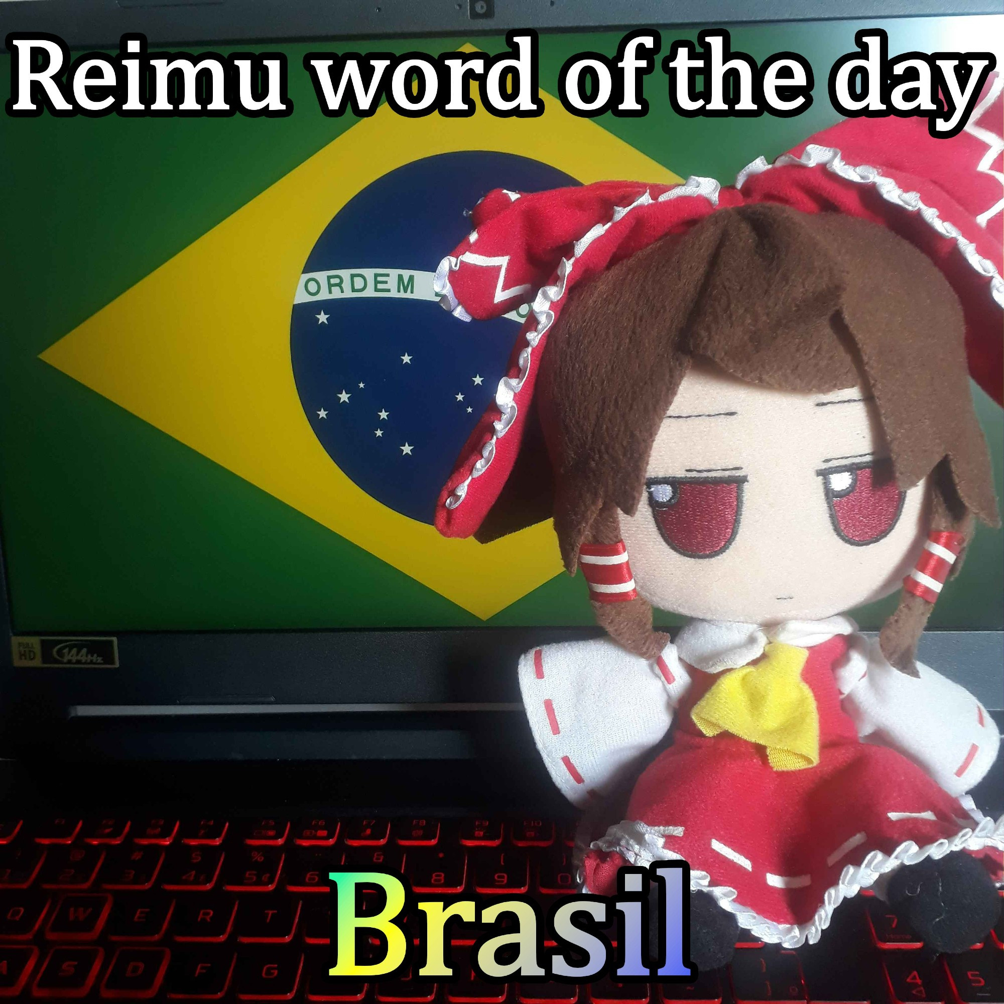 Reimu Hakurei fumo, siting in a laptop and on the screen of this laptop is the Brazilian flag, with the title in the image: Reimu word of the day: Brasil