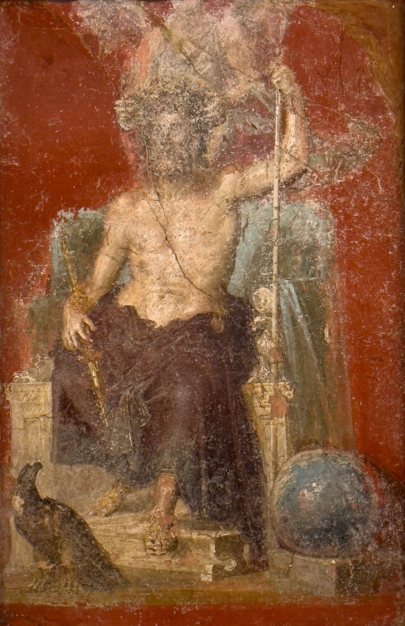 Fresco of an enthroned Zeus, torso bare and legs covered with imperial purple colored drapery; he cradles a golden lightning bolt in his right arm, and holds a silver scepter in his left. Victory (Nike) stands behind Zeus' throne, crowning him with a wreath of laurel leaves. Zeus' eagle (and the symbol of Rome) perches in front of the throne, looking up at the god; a globe (of the earth or the heavens?) is to the right of the throne.

Pompeii, House of the Dioscuri (VI, 9, 6-7, atrium 37)
62-79 CE

Museo Archeologico Nazionale, Naples (MANN inv. 9551)