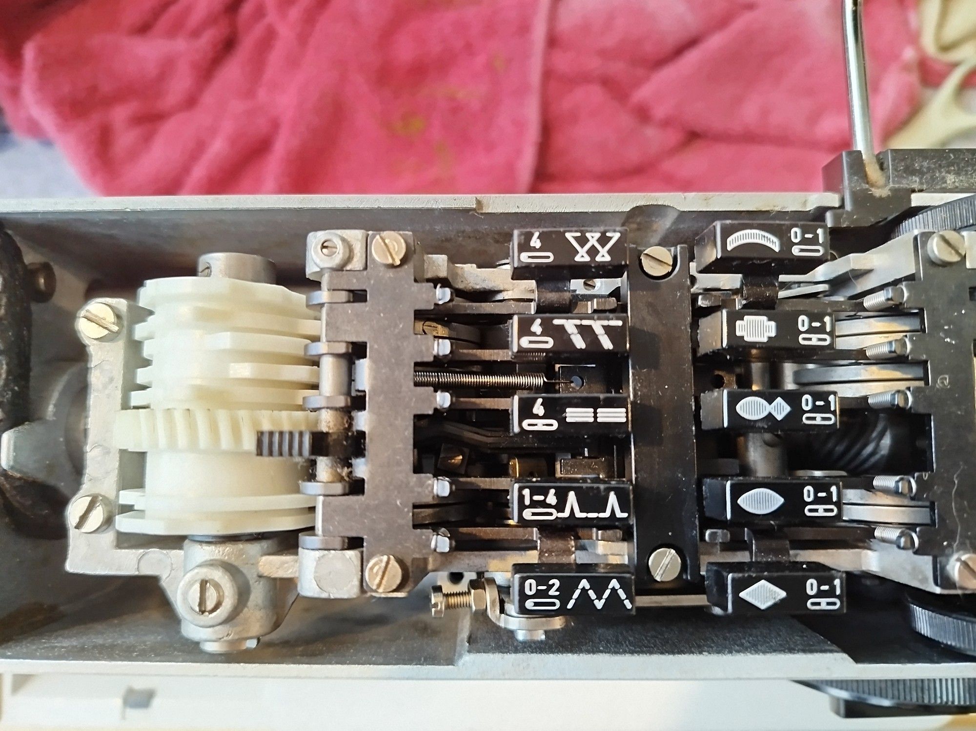 Top down view showing the functional and ornamental stitch selector array.