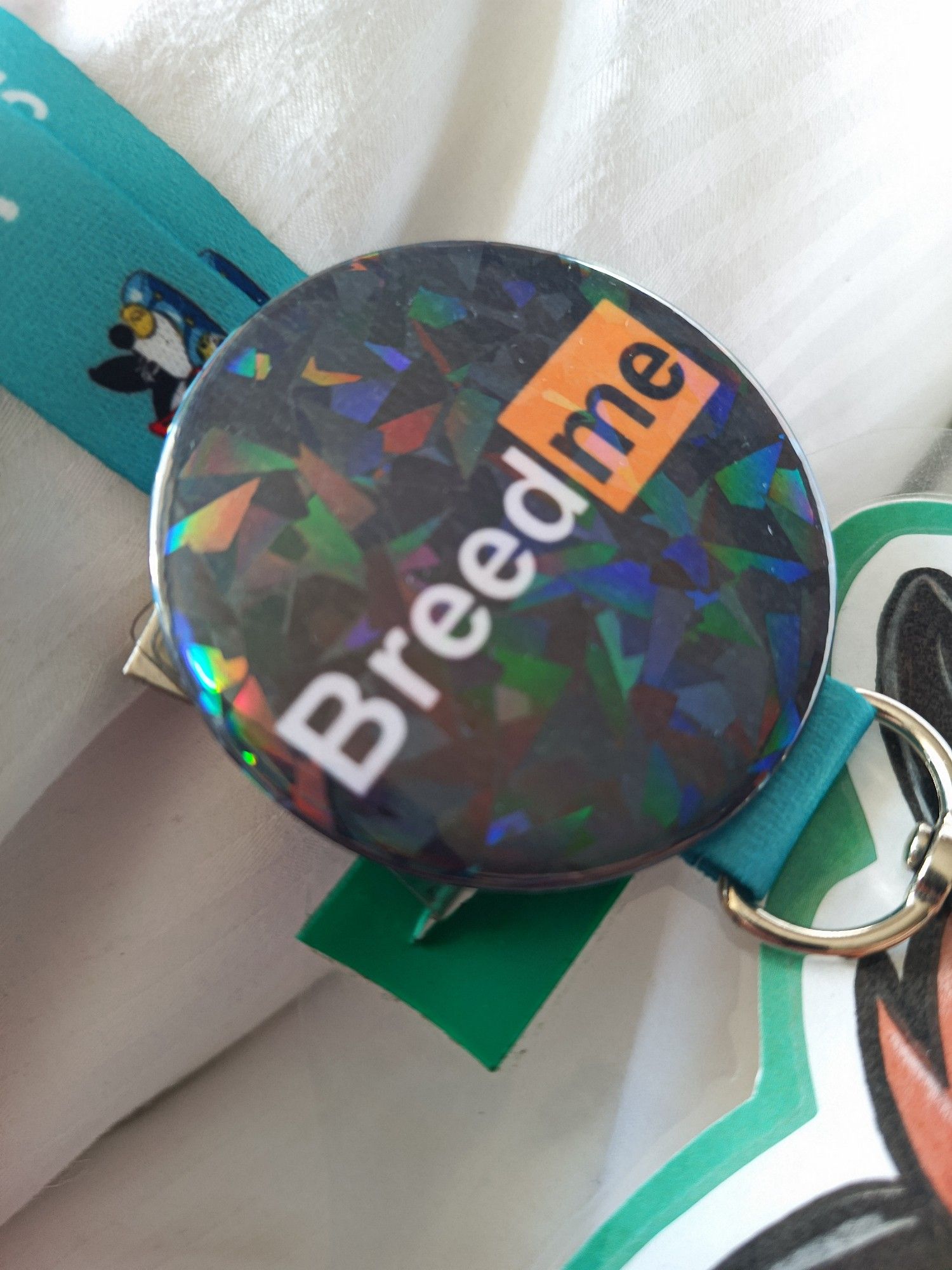 A badge that says "breed me" in the style of the pornhub logo