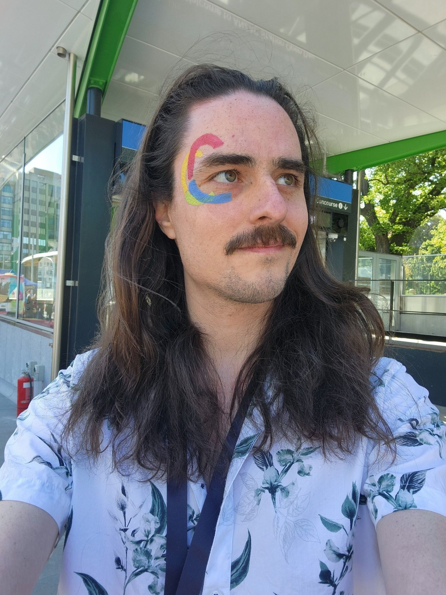 Selfie outside Anzac Station. I have the Metro Tunnel logo painted on my face.