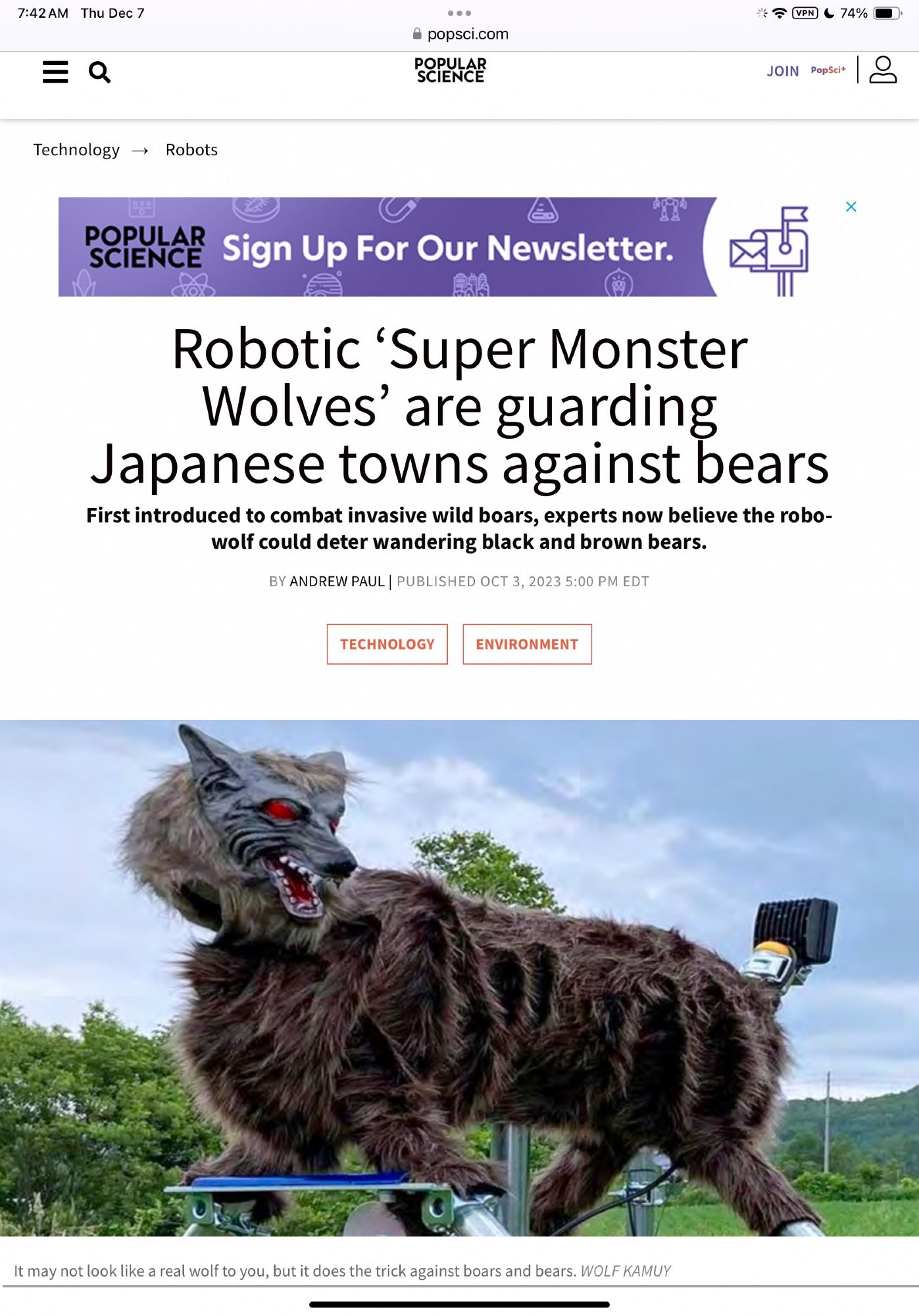 A screenshot of an article from Popular Science with the headline, “Robotic Super Minster Wolves are Guarding Japanese Towns from Bears.” A picture shows a scary large robot wolf covered in fur with sharp fangs and bright red eyes.”