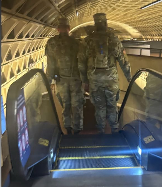 A picture of a soldier on the DC Metro, and he needs to be told “stand to the right.”  Photo from @washingtonianprobs on IG.