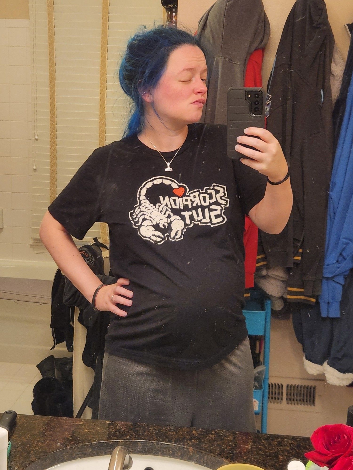 Exhausted, pregnant blue haired bitch who can't sleep ffs wearing a Scorpion Slut T-shirt. Please ignore my filthy mirror.