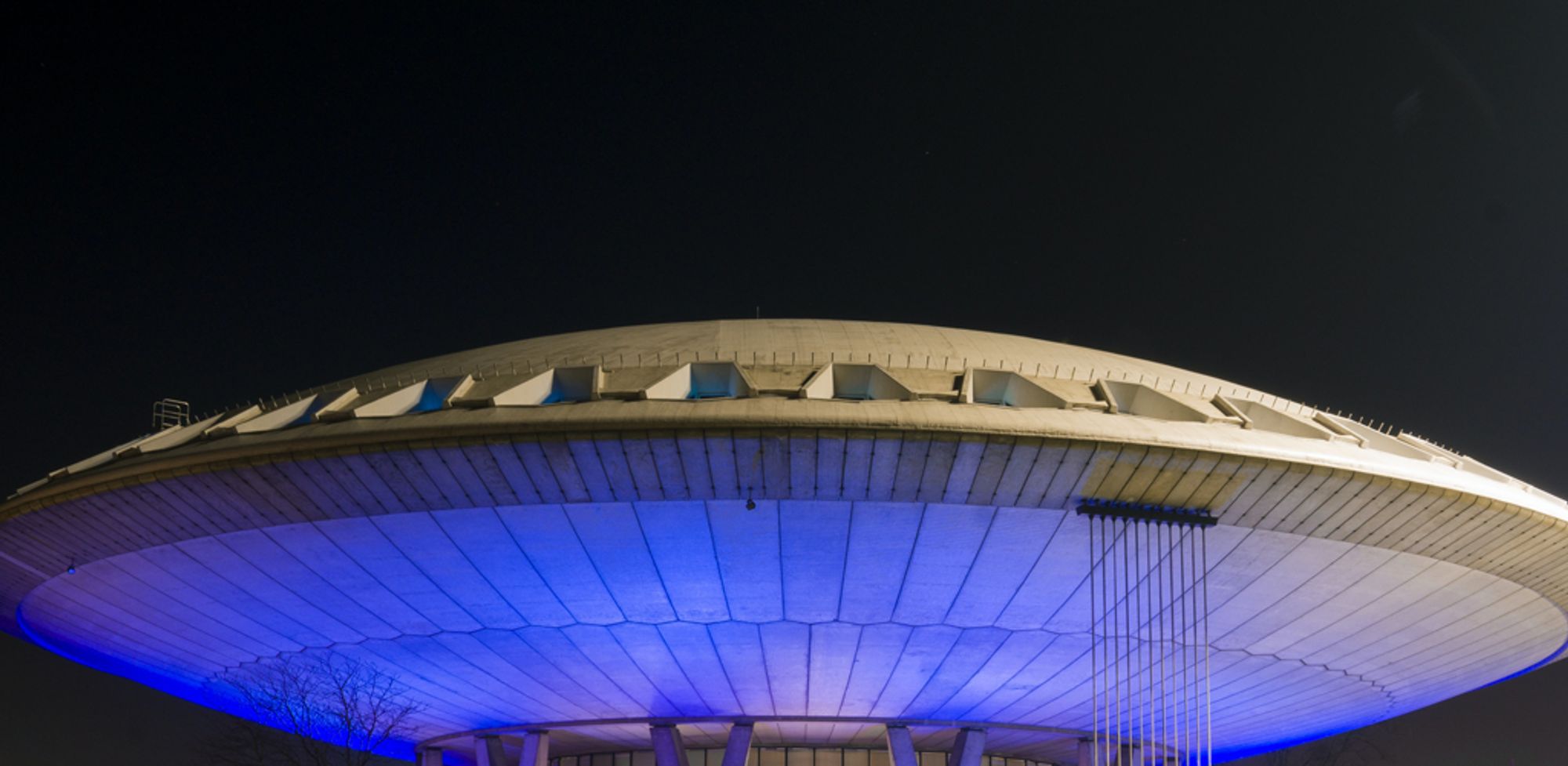 UFO lit up with blue light