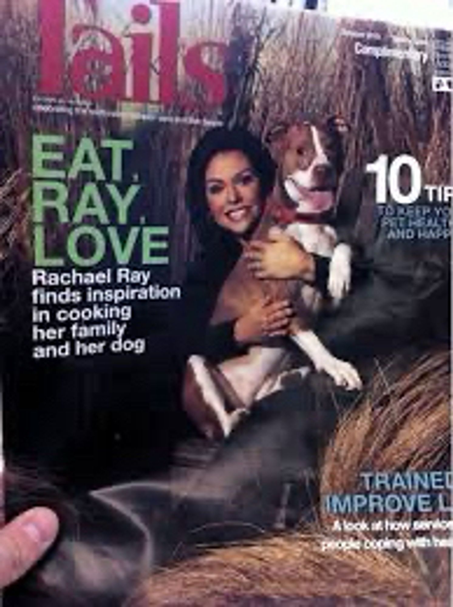 Fake magazine cover featuring Rachael Ray that has a cover photo of her hugging her dog and the headline:

EAT
RAY
LOVE
Rachael Ray 
finds inspiraton
In cooking 
her family
and her dog