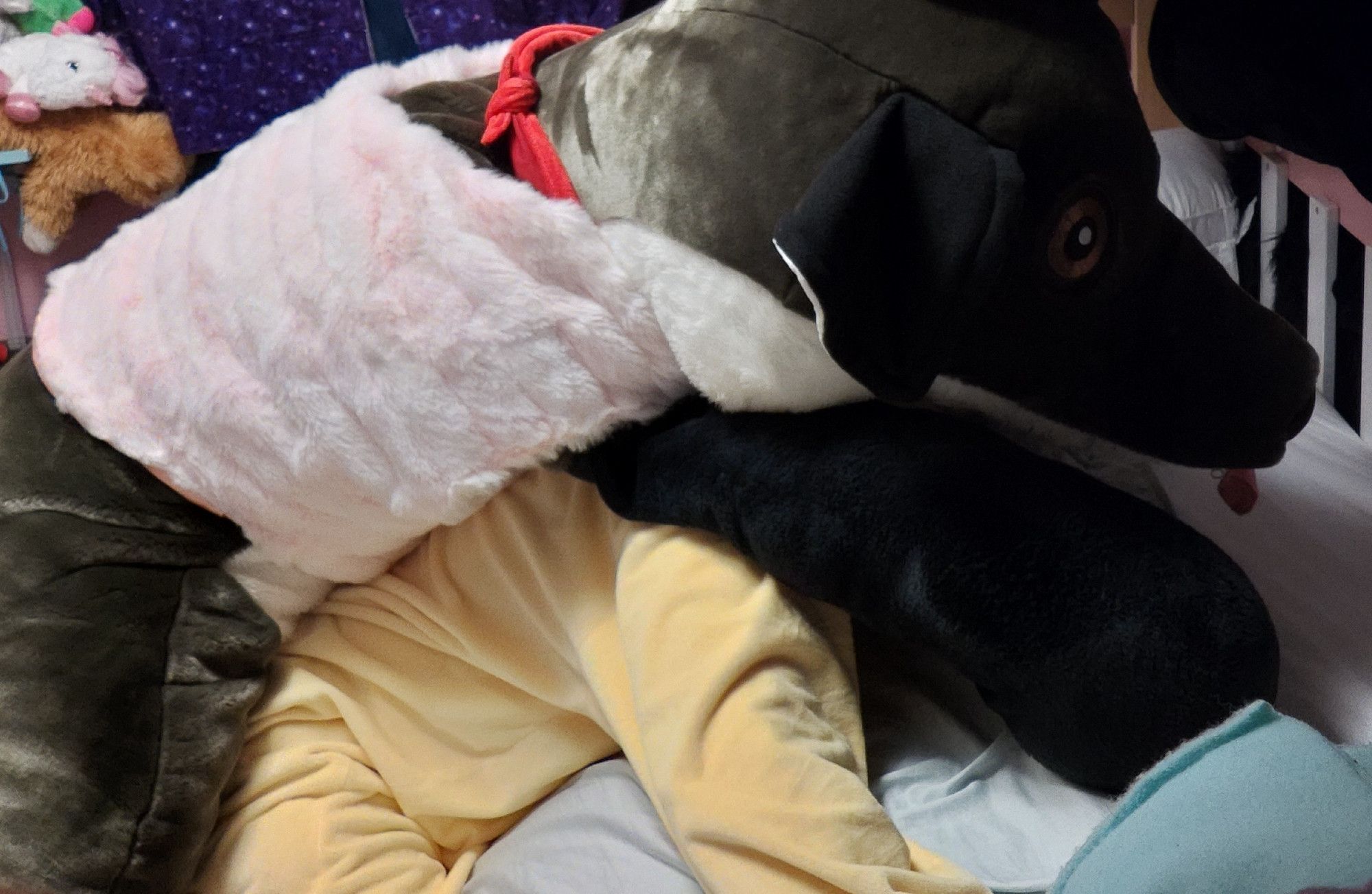 Massive plush fox on top of a person in a kigu, NSFW implied