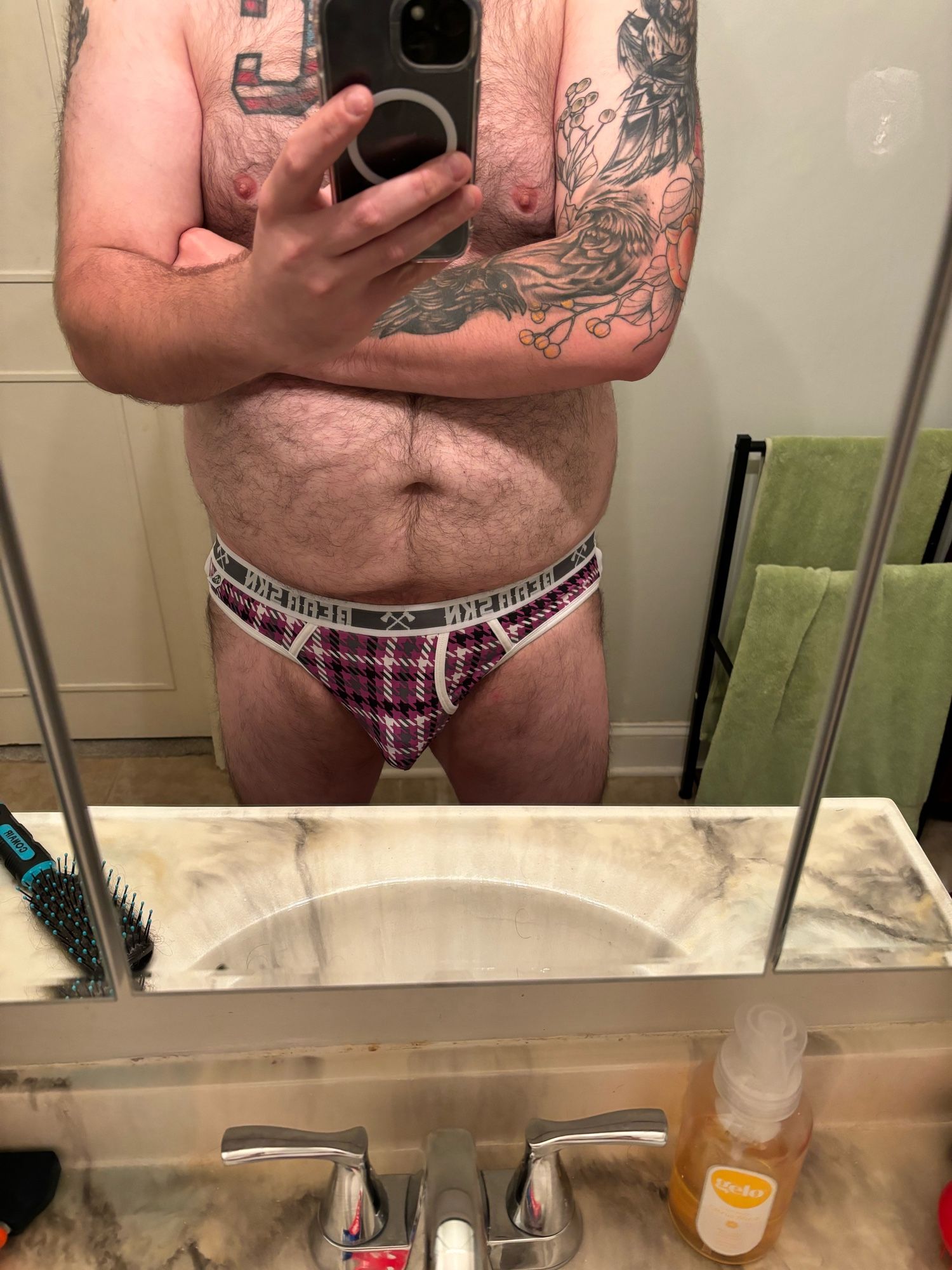 Me wearing a plaid purple, black, and grey jock