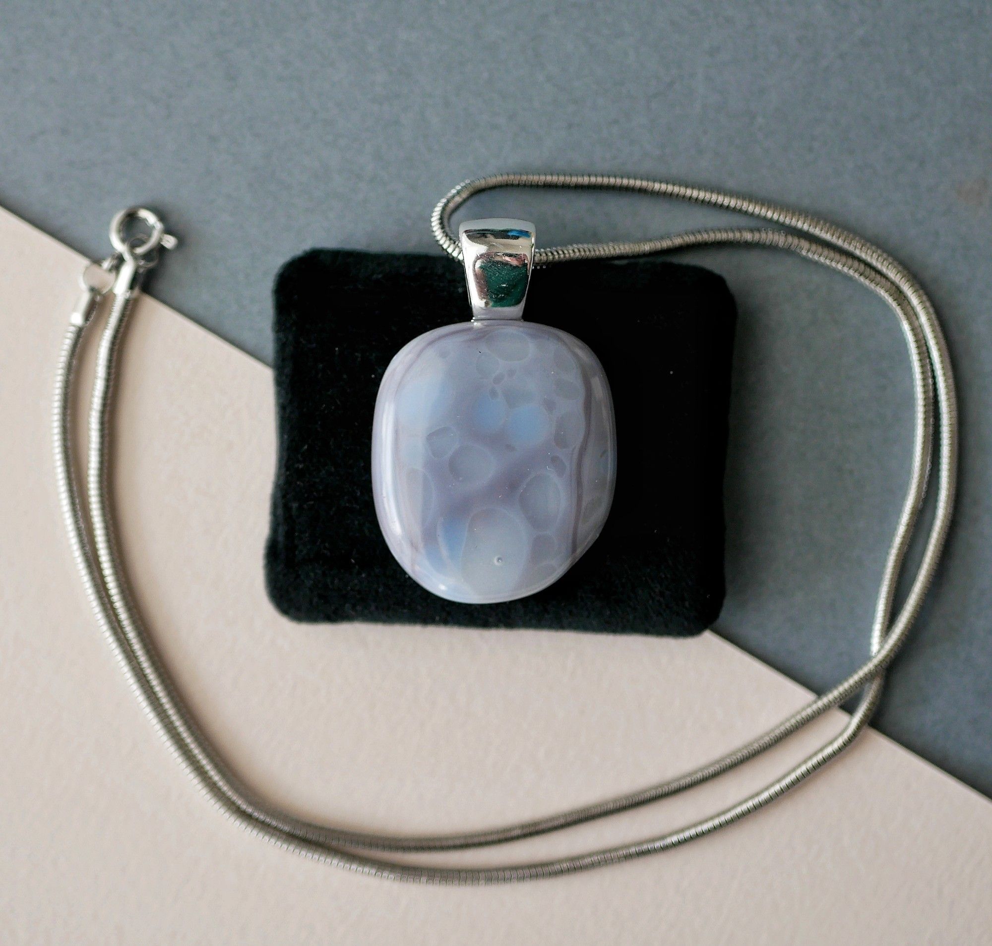 purple and grey pendant with translucent speckles on top