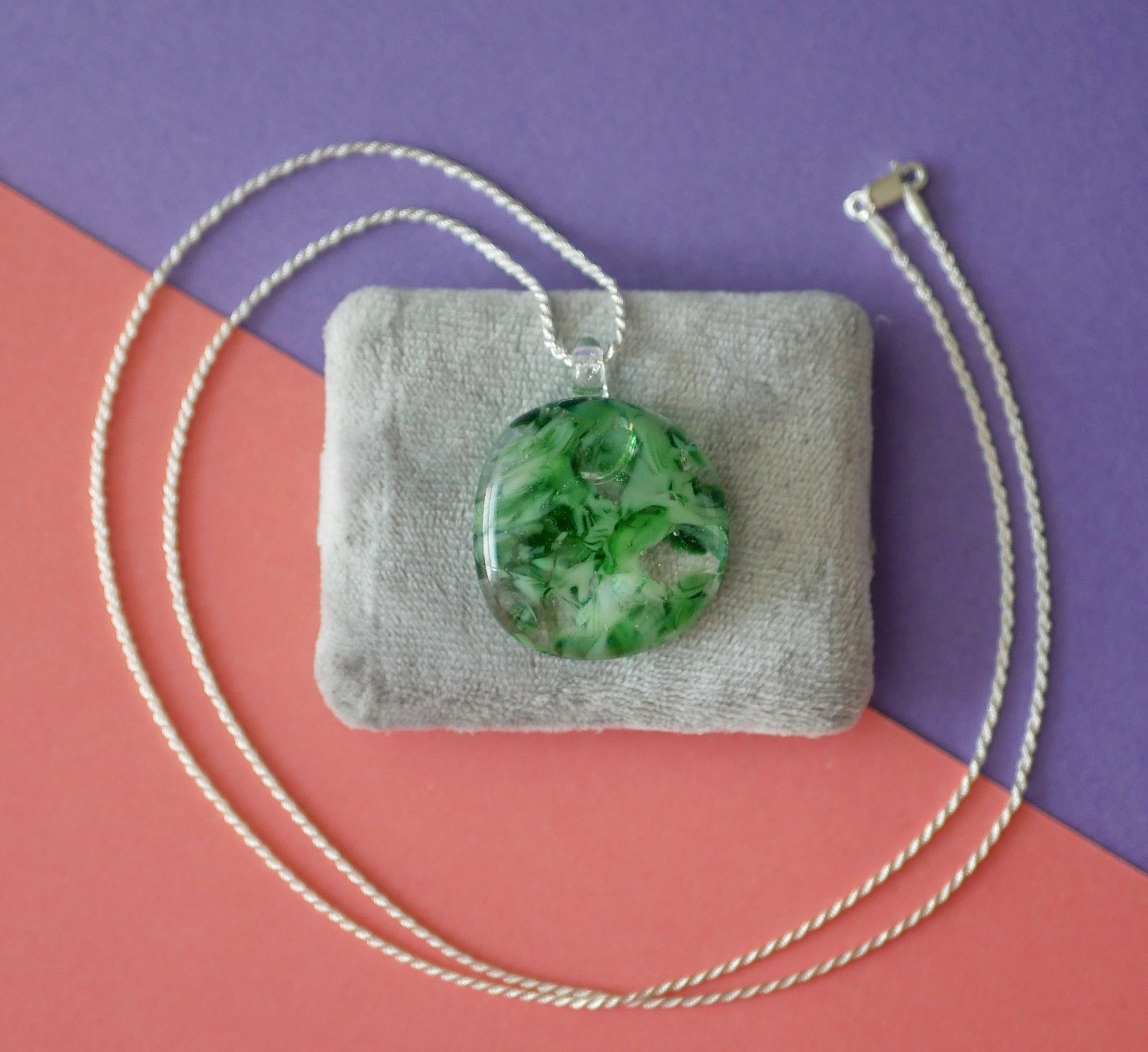 green and clear sparkly pendant