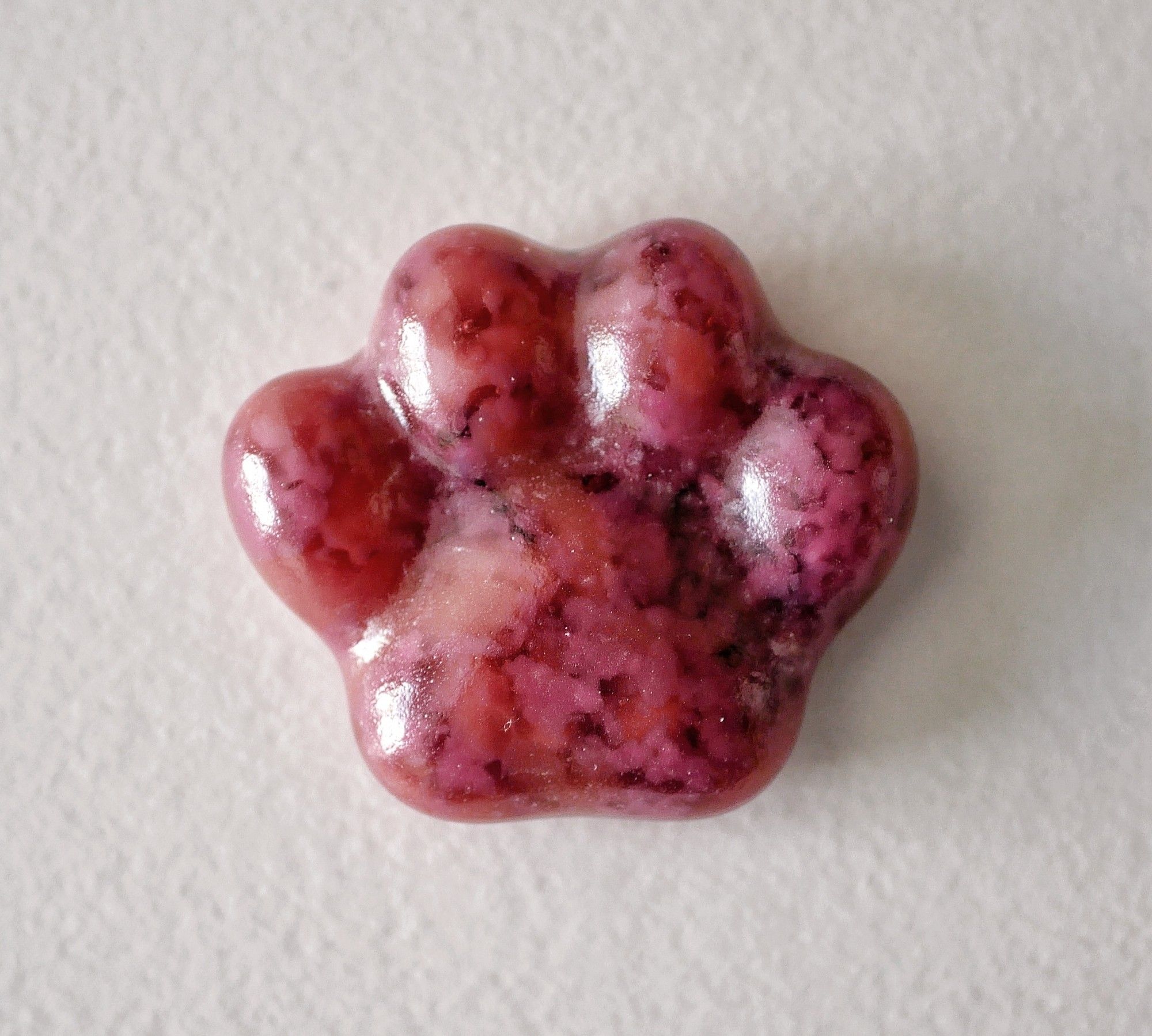 pink glass paw