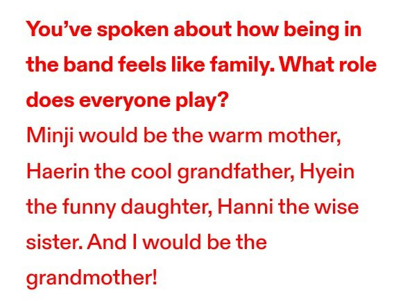 Interview snippet: "You've spoken about how being in the band feels like family. What role does everyone play?" Danielle's answer: "Minji would be the warm mother, Haerin the cool grandfather, Hyein the funny daughter, Hanni the wise sister. And I would be the grandmother!"