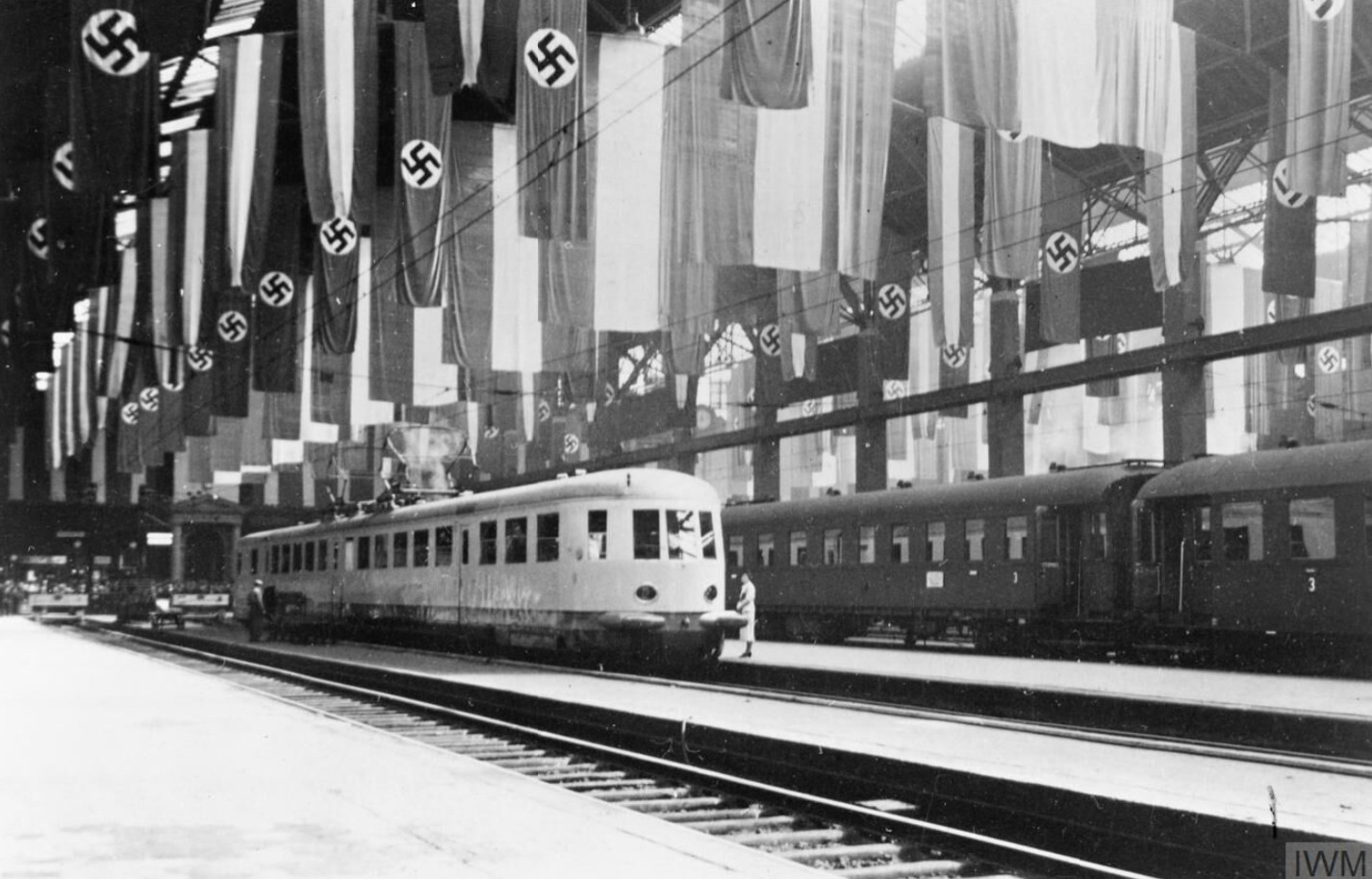 Berlin railway station decorated with flags for the state visit of Mussolini to Germany, 25-28 September 1937. Courtesy of Imperial War Museum.
