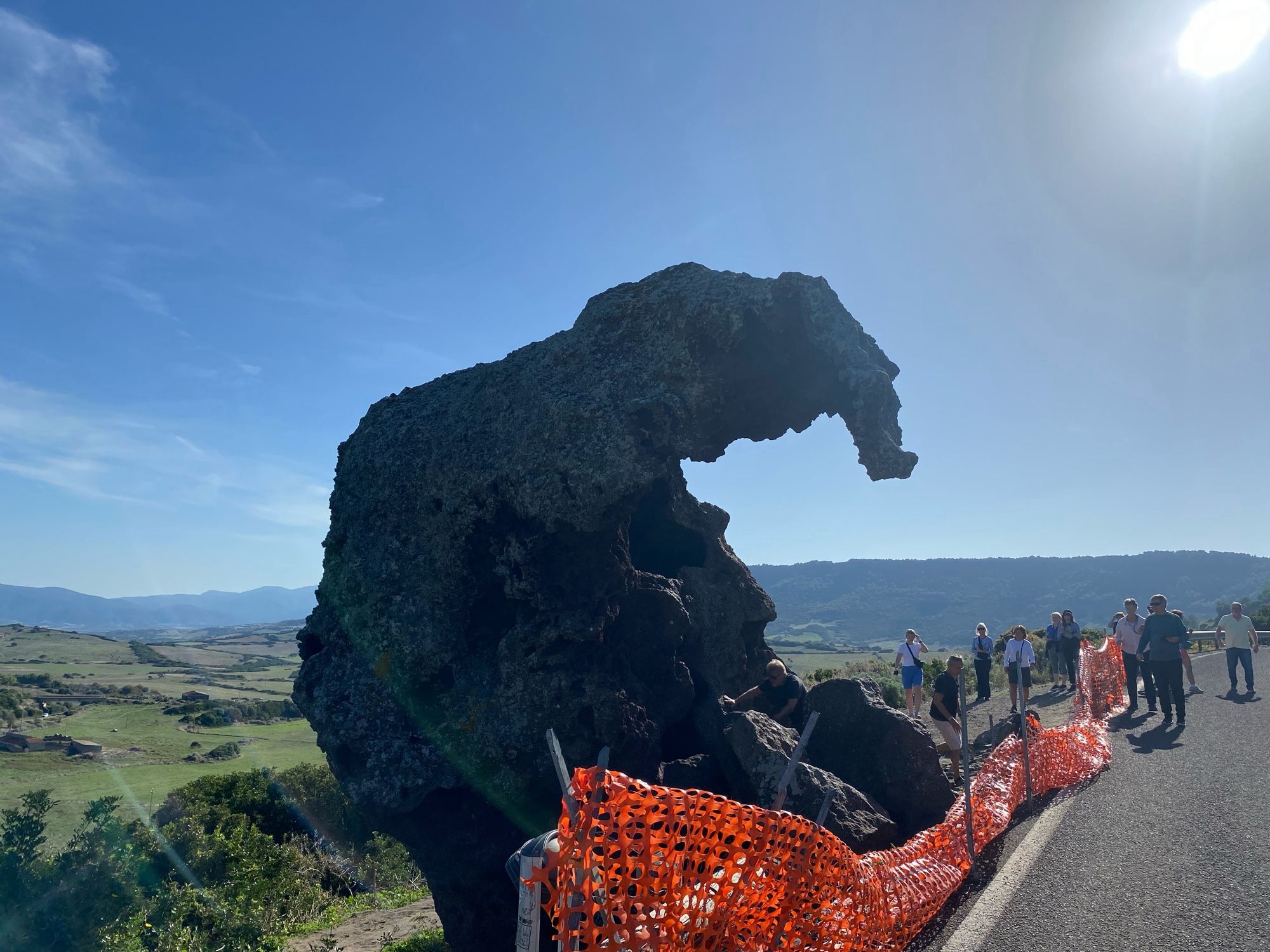 Enormous rock eroded over centuries into the shape of an elephant looms over the green countryside and rolling hills of Sardinia