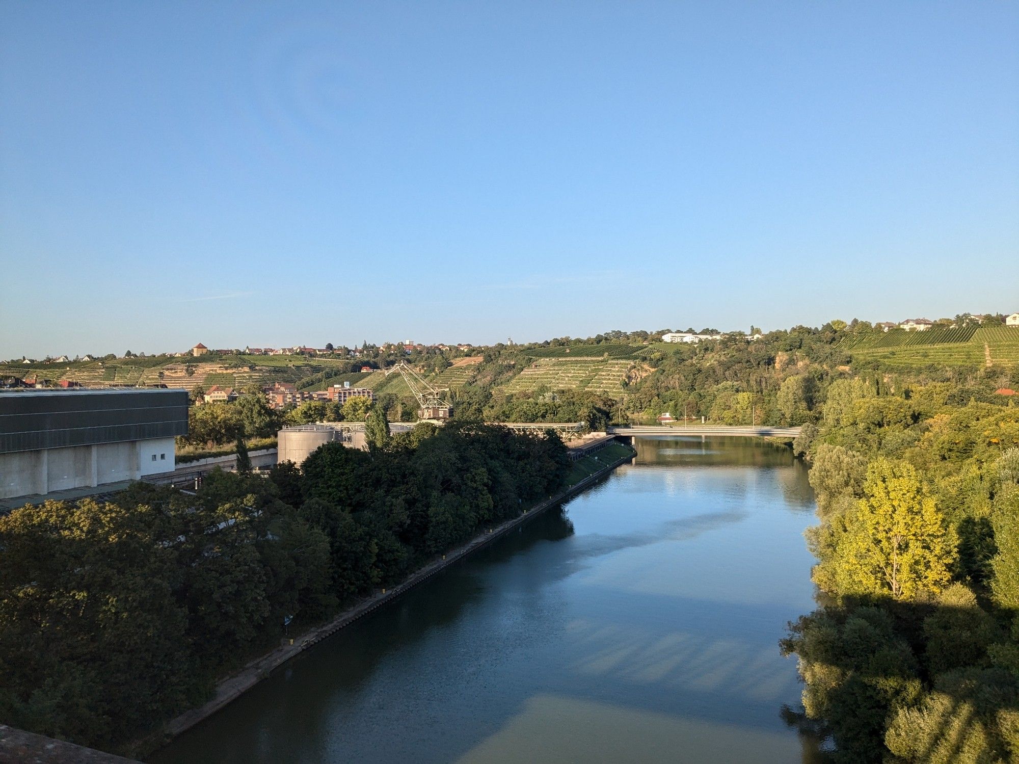 View from the Münster viaduct between Ebitzweg and Münster station above the Neckar river and a power station