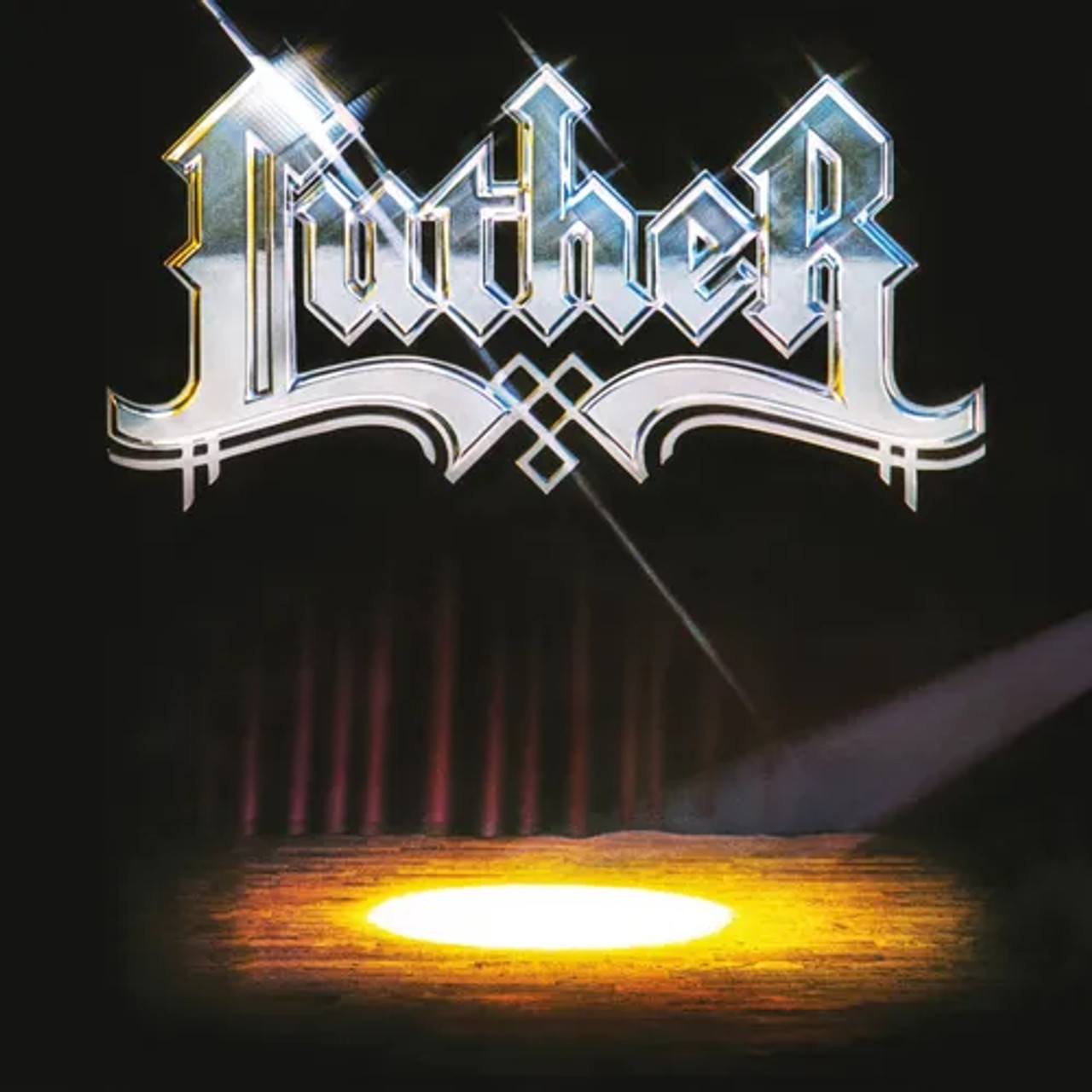 Album cover for 'Luther' featuring the name in shiny, metallic Gothic-style lettering at the top, with a spotlight shining on an empty wooden stage against a dark background with faint red curtains