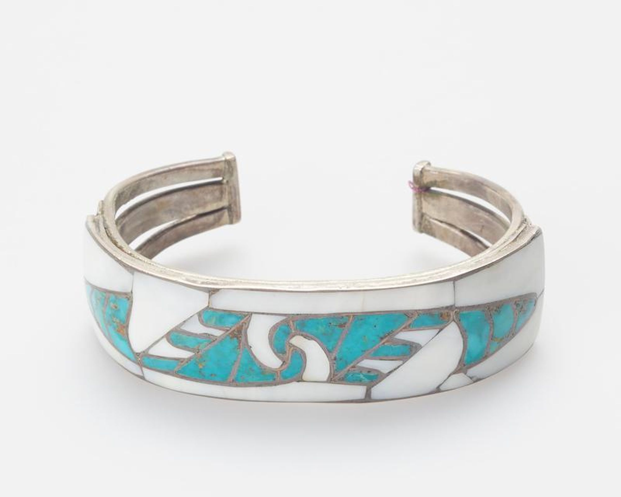 Zuni. Three sheet silver bands set with abalone and Fox turquoise inlay mounting; applique and stamped decoration J.#320, Cat.#364