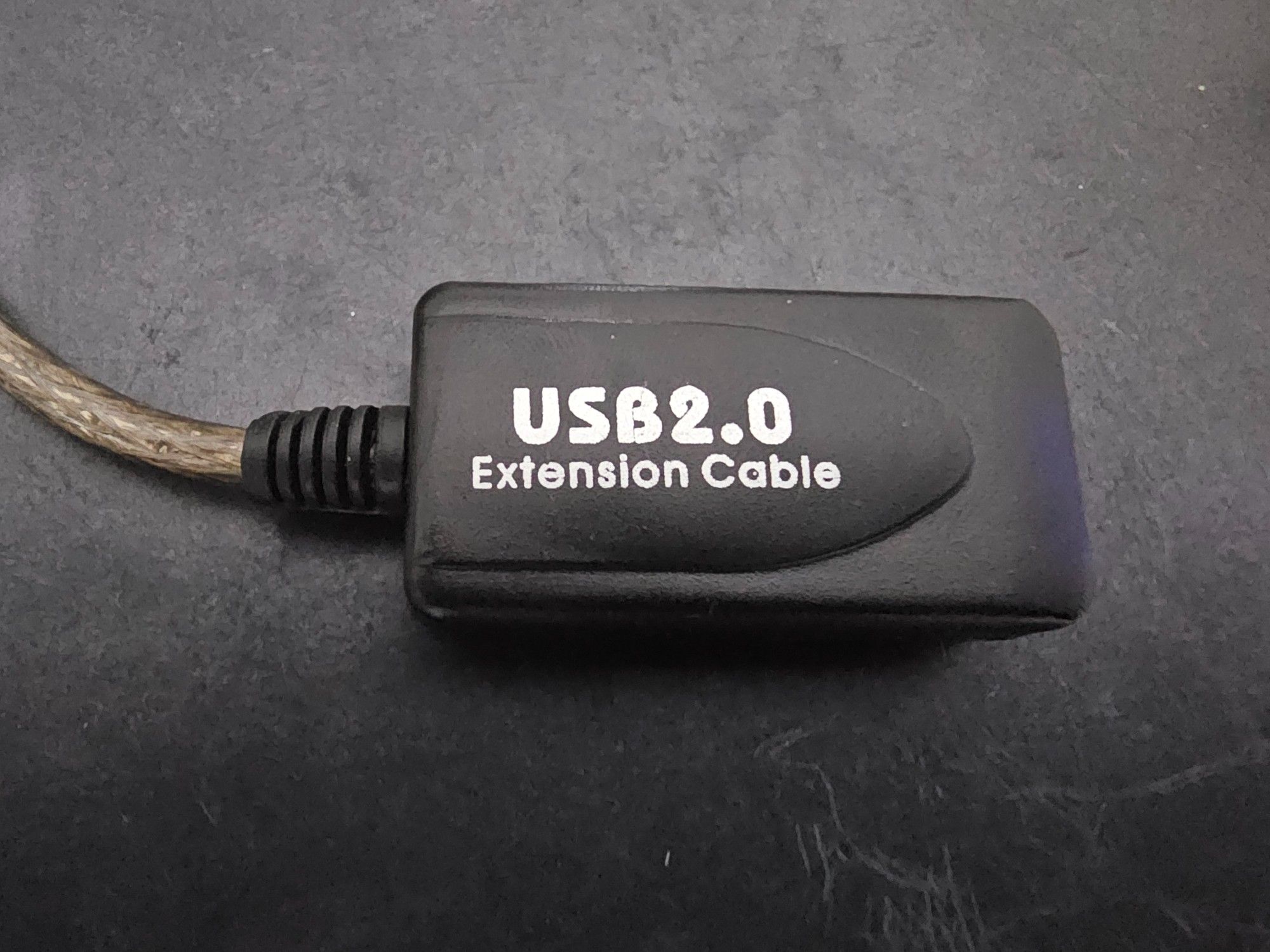 Black box marked "USB2.0 Extension Cable" with a cable coming out of one side