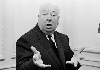 Foto di Alfred Hitchcock con espressione molto stupefatta