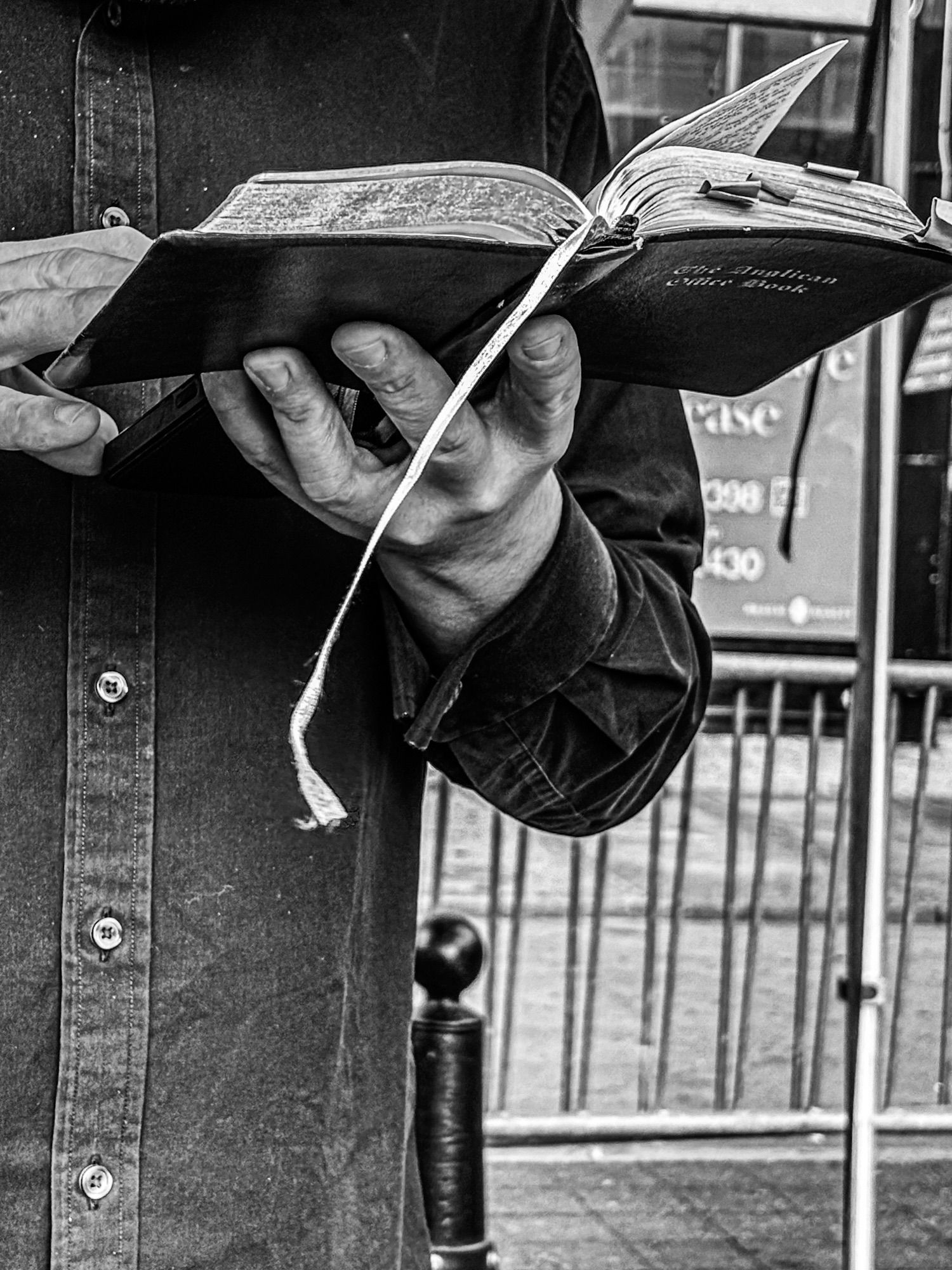 Black and White image of a man praying