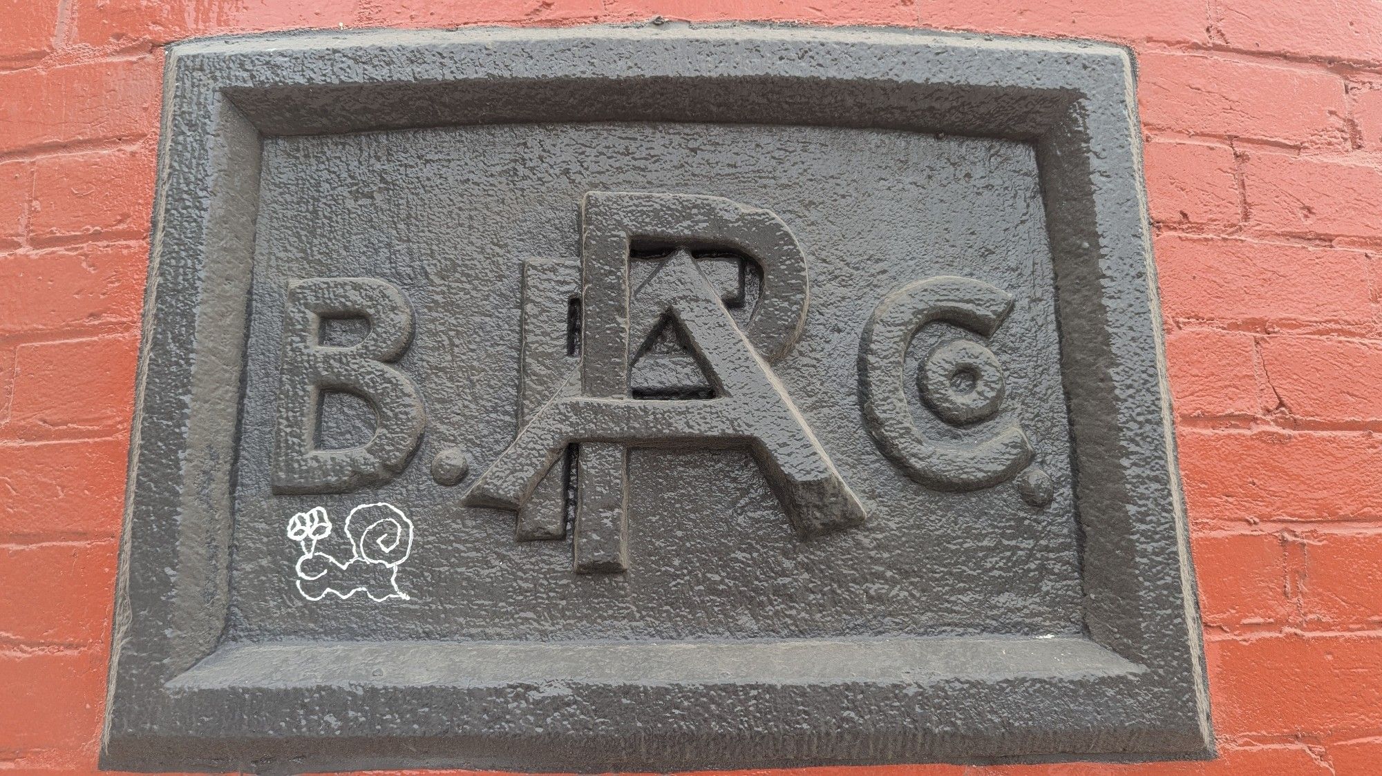 black dedication plaque on red brick 

PA B. F. Co

🐌