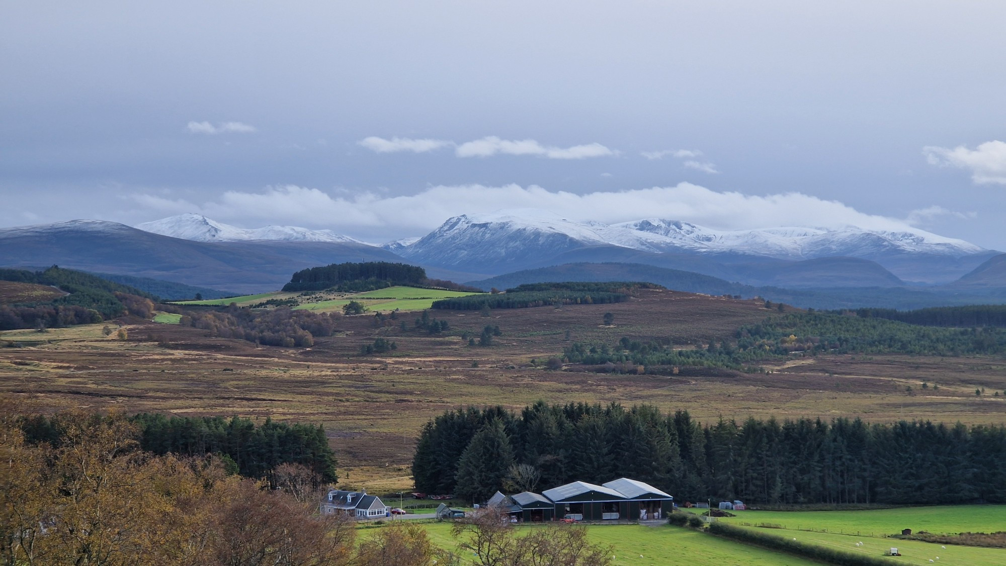 A view over some of the Cairngorm mountains, capped with snow