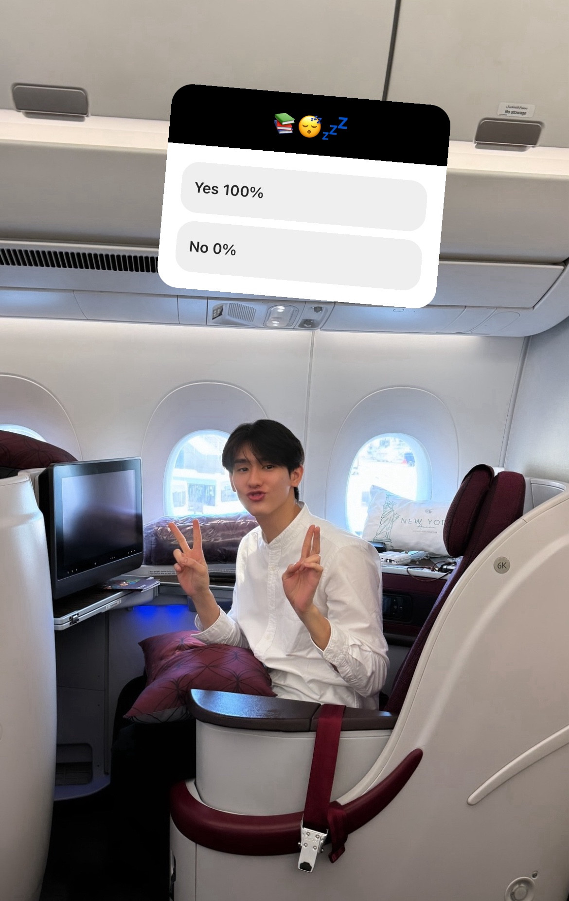 a silly picture of book in his seat on a plane, making a face and doing peace signs with a pillow on his lap. force included a poll asking people whether they think he’ll fall asleep. “yes 100%” is winning by a landslide.