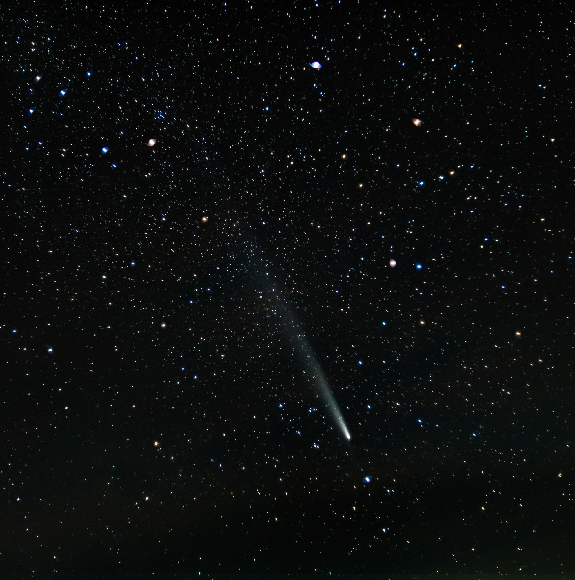 The comet taken with a 50 year old lens so you get really cool star rendering, I believe this is 18 shots stacked