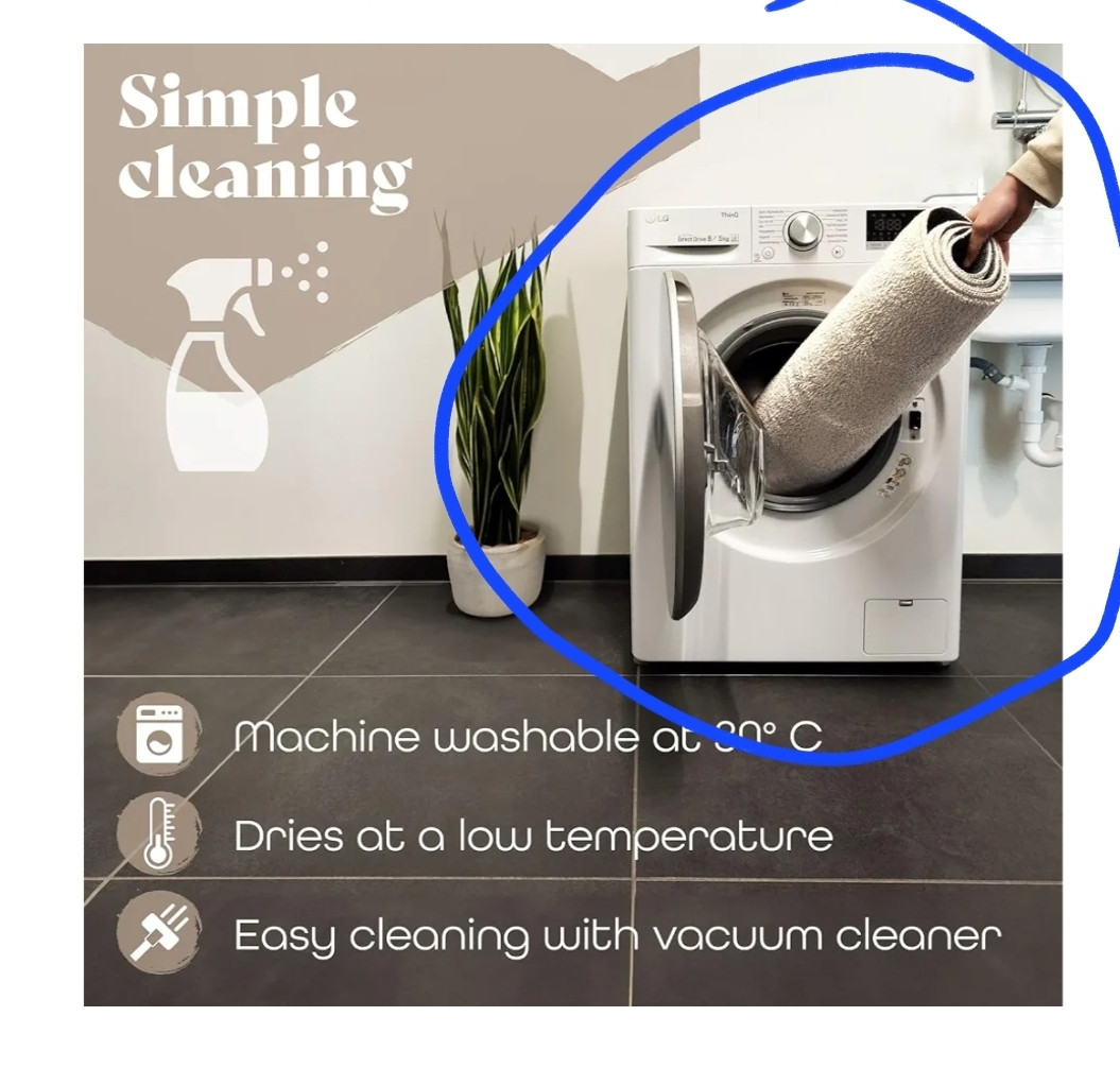 Picture of a massive carpet, rolled, being crammed into a washing machine with the caption "machine washable at 30 degrees"